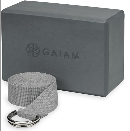 Gaiam Yoga Block - Supportive Latex-Free Eva Foam - Soft Non-Slip Surface with Beveled Edges for Yoga, Pilates, Meditation - Yoga Accessories for Stability, Balance, Deepen Stretches - Black/Strap Combo