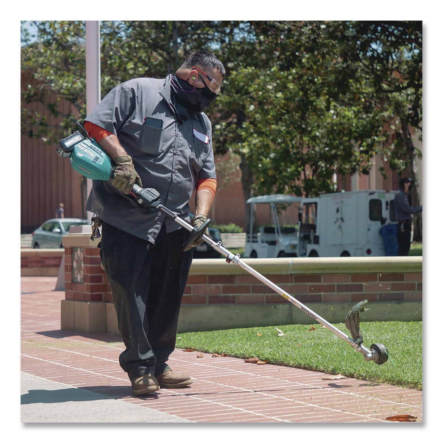 XGT Brushless Lithium-Ion Cordless Couple Shaft Power Head With String Trimmer Attachment Kit, 71.75" Long, Teal/Black/Silver