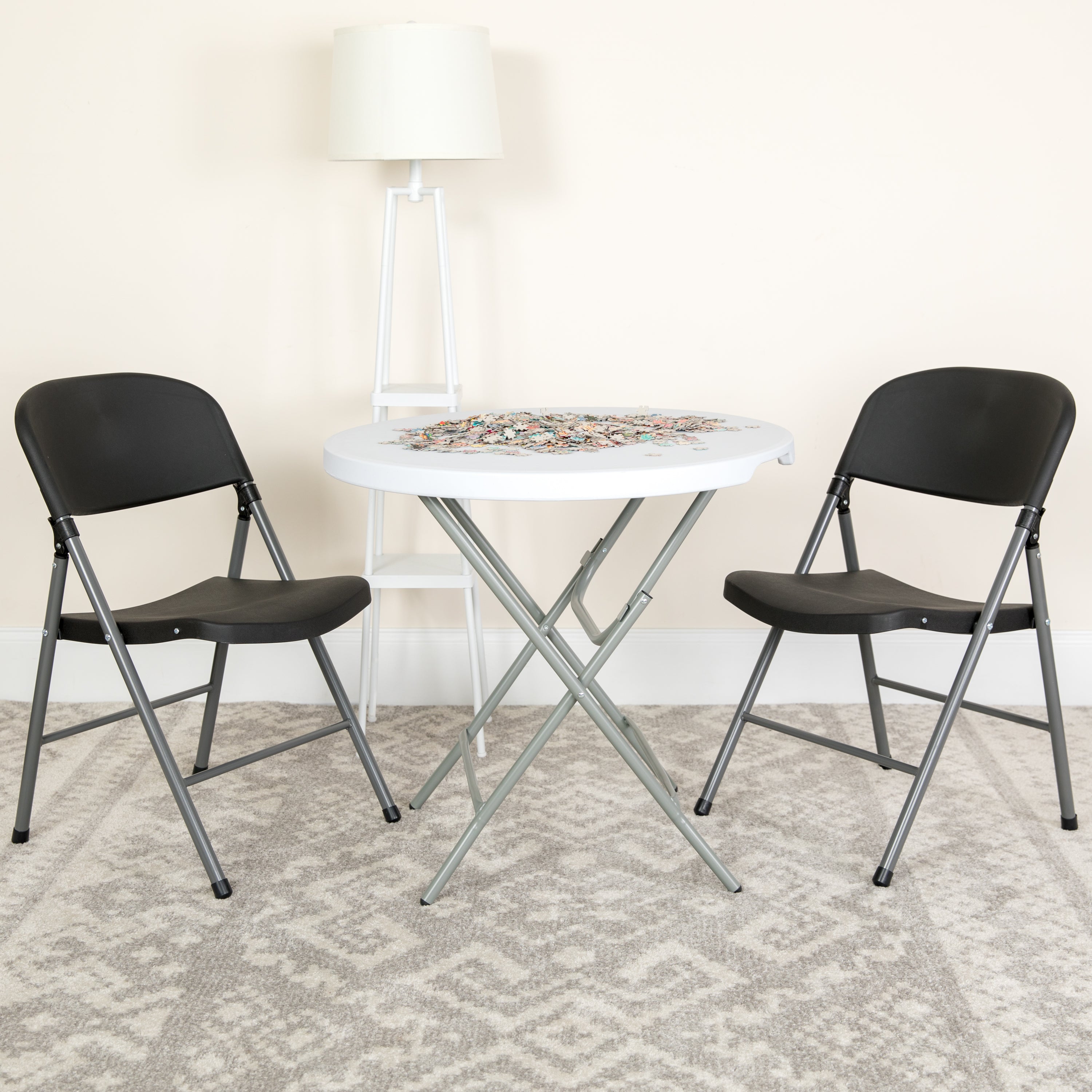 2 Pack HERCULES Series 330 lb. Capacity Black Plastic Folding Chair with Charcoal Frame