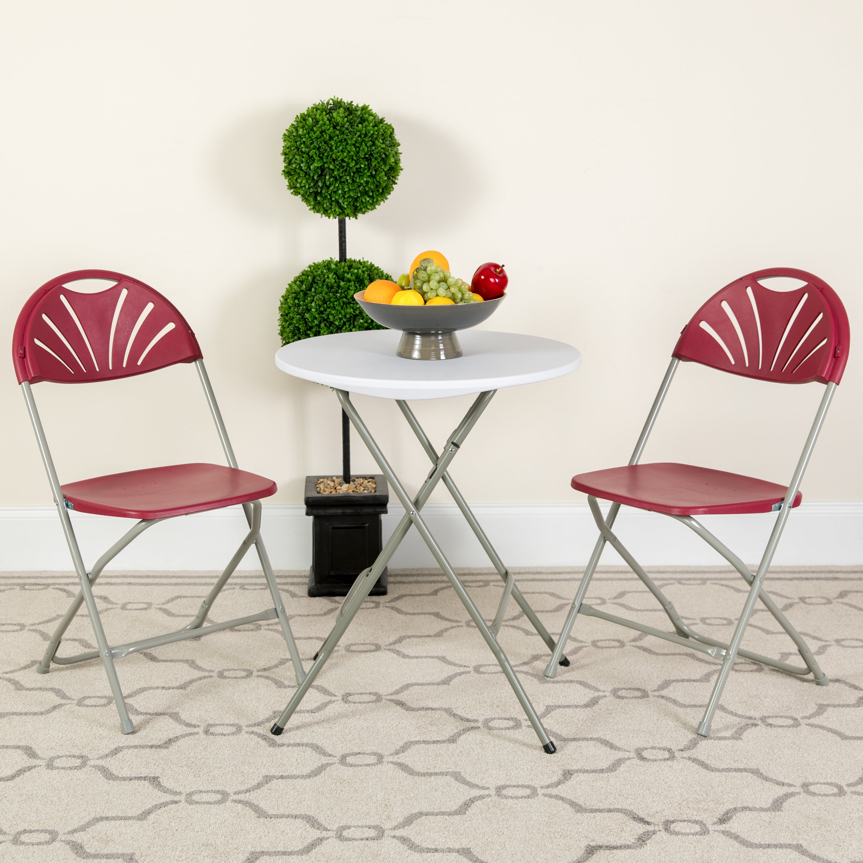 2 Pack HERCULES Series 650 lb. Capacity Burgundy Plastic Fan Back Folding Chair