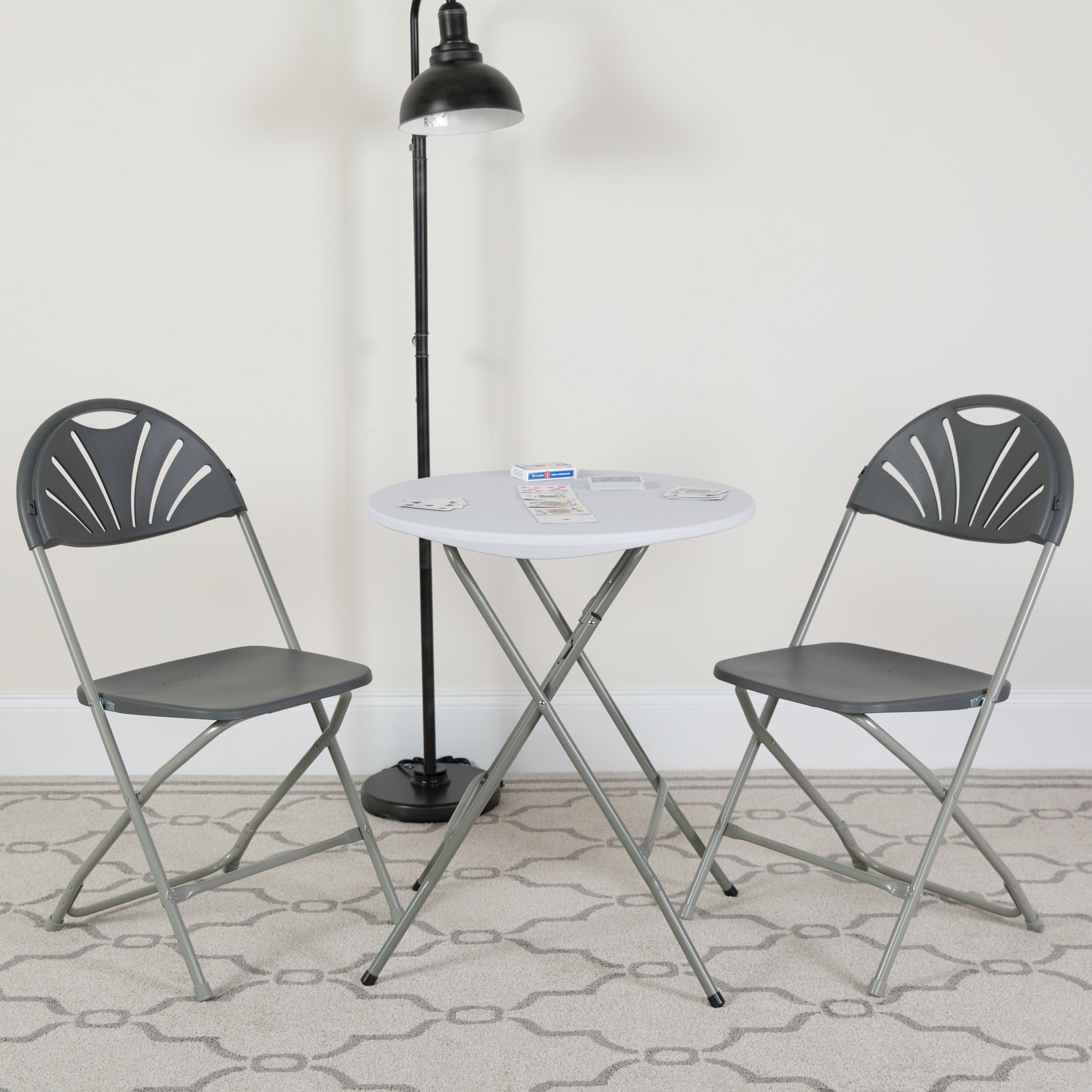 2 Pack HERCULES Series 650 lb. Capacity Charcoal Plastic Fan Back Folding Chair