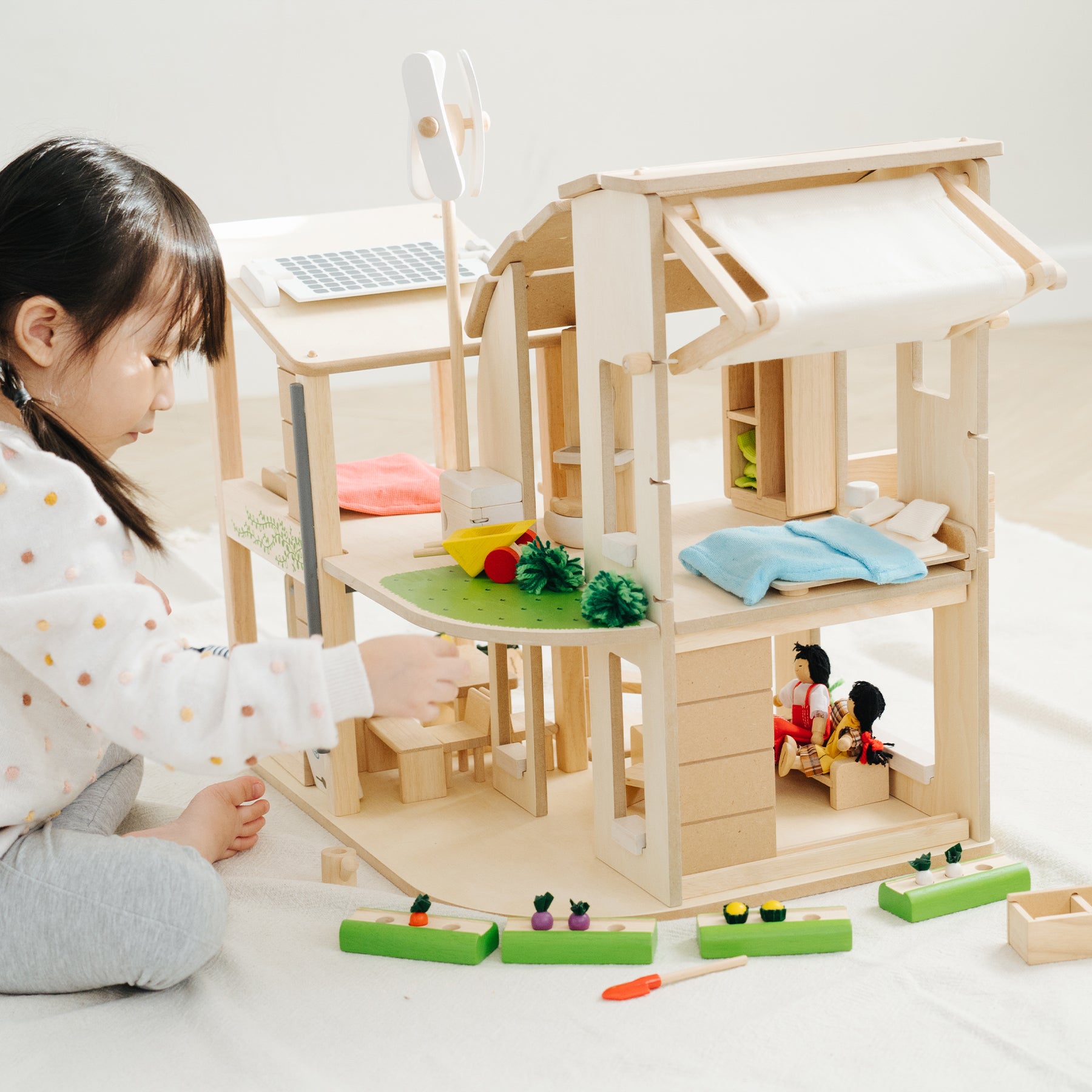 Green Wooden Dollhouse With Furniture