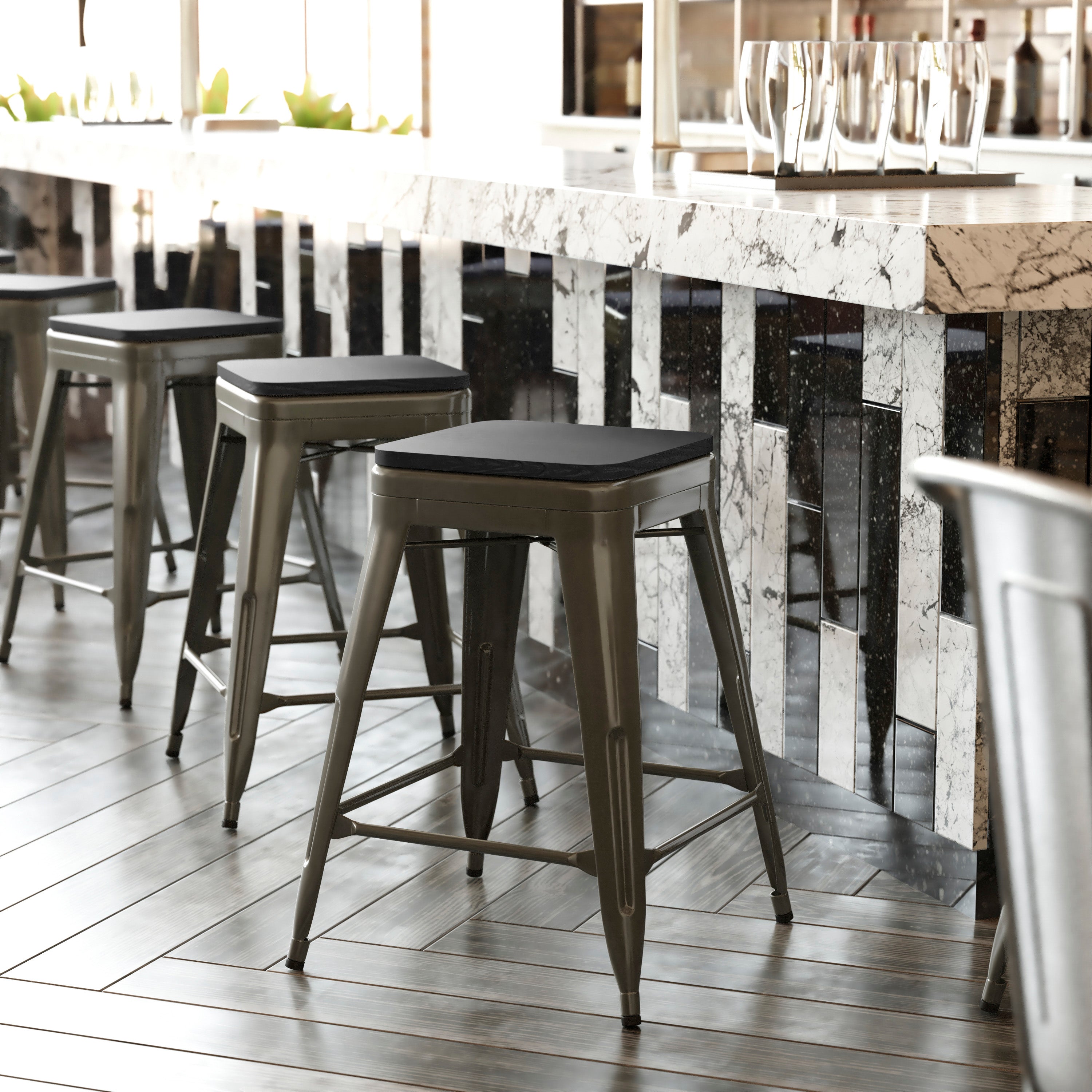 Cierra Set of 4 Commercial Grade 24" High Backless Gunmetal Metal Indoor Counter Height Stools with Black All-Weather Poly Resin Seats