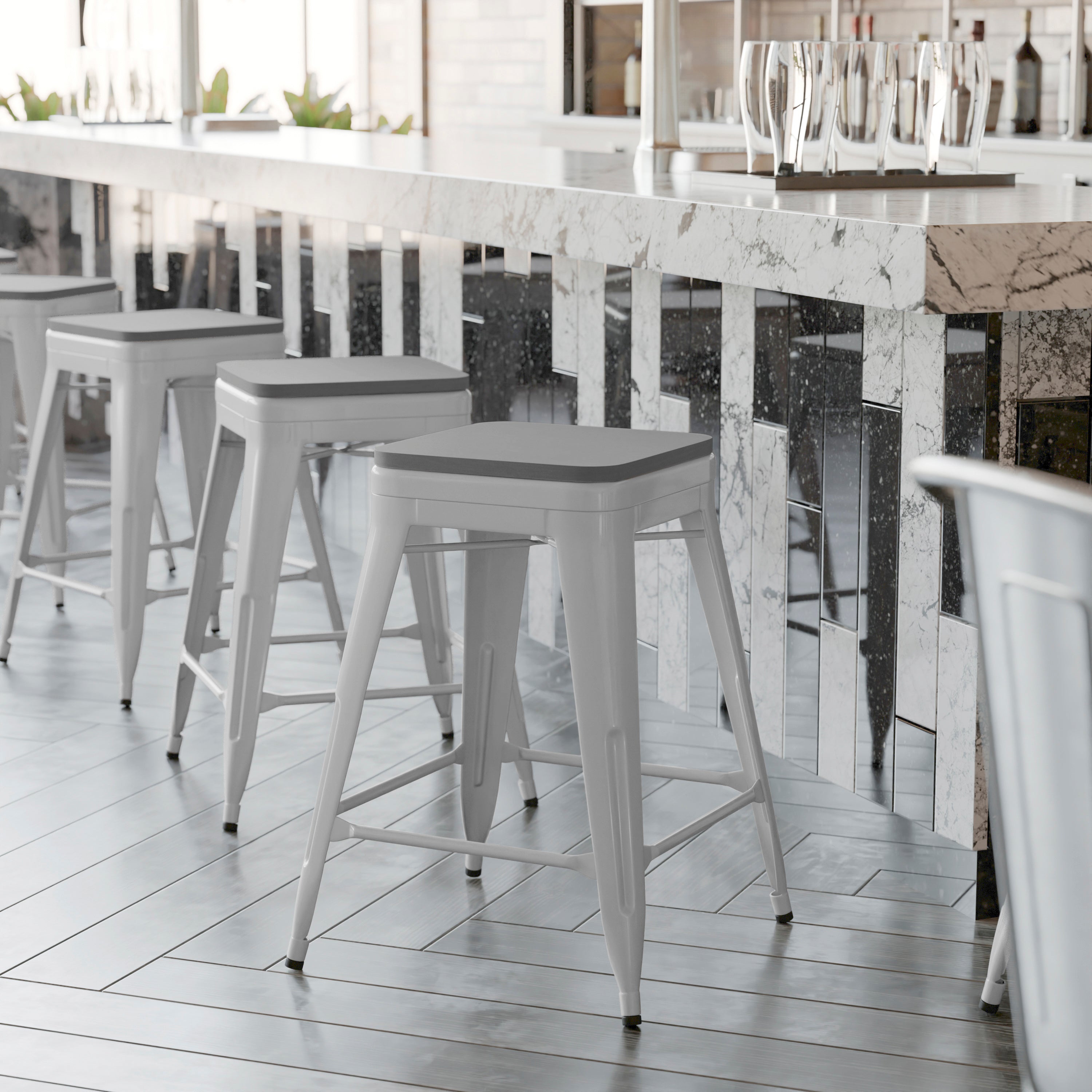 Cierra Set of 4 Commercial Grade 24" High Backless Silver Metal Indoor Counter Height Stools with Gray All-Weather Poly Resin Seats