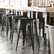 Cierra Set of 4 Commercial Grade 30" High Backless Black Metal Indoor Bar Height Stools with Black All-Weather Poly Resin Seats