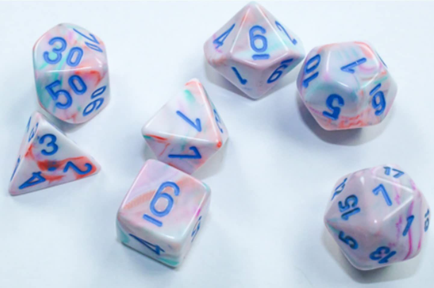 Chessex Dice Set – 10mm Festive Pop Art/Blue Plastic Polyhedral Dice Set – Dungeons and Dragons D&D DND TTRPG Dice – Includes 7 Dice - D4 D6 D8 D10 D12 D20 D%