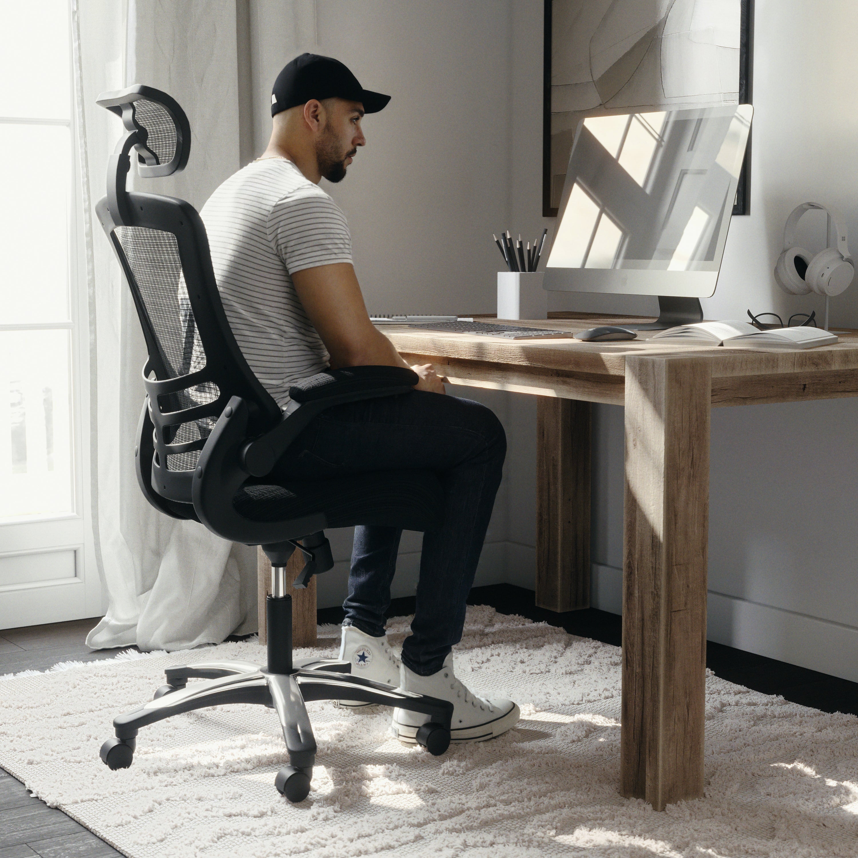 Kelista High-Back Black Mesh Swivel Ergonomic Executive Office Chair with Flip-Up Arms and Adjustable Headrest