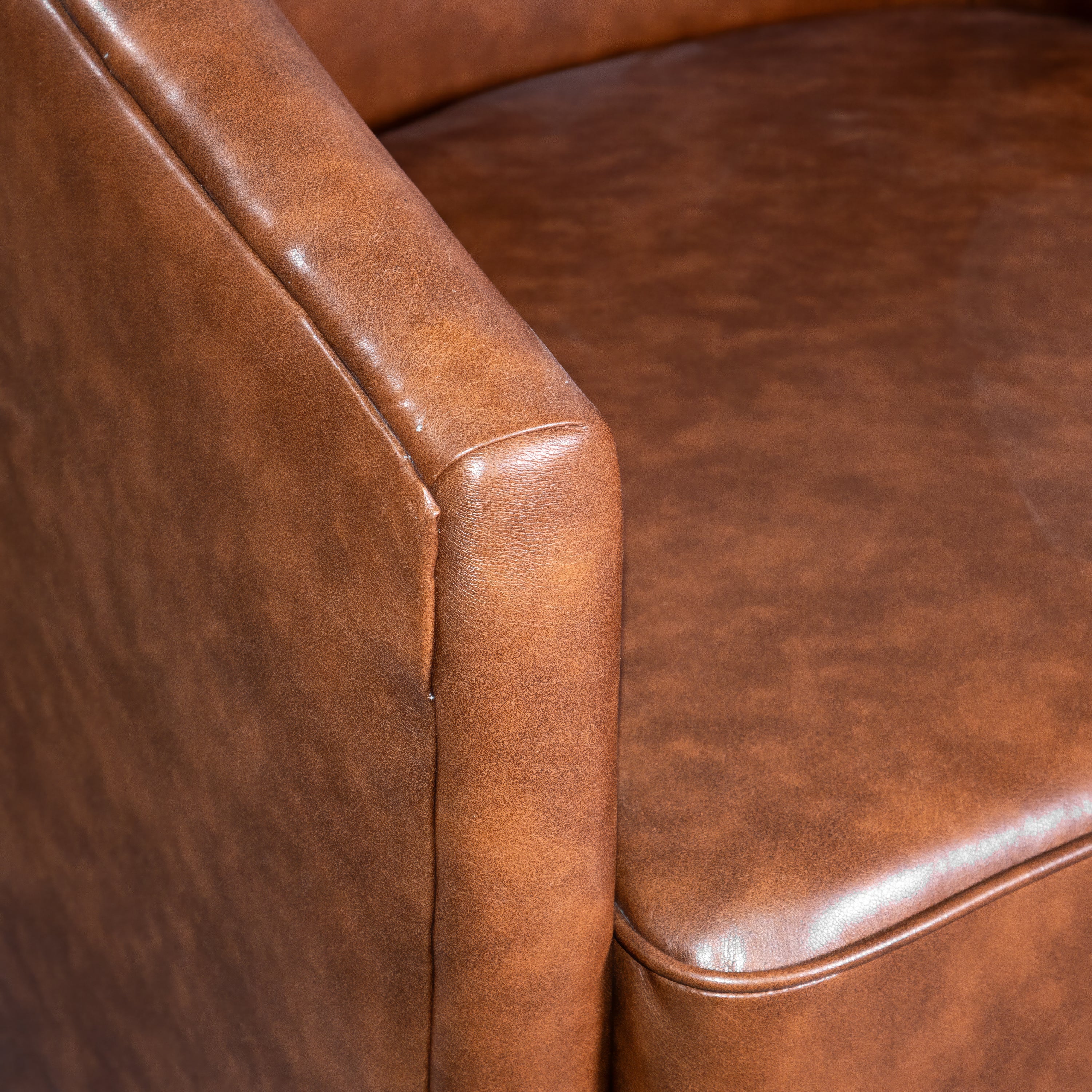 Dean Club Style Commercial Barrel Accent Armchair with 360 Degree Swivel Metal Base and Sloped Armrests in Brown LeatherSoft Upholstery