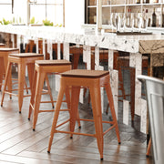 Kai Commercial Grade 24" High Backless Orange Metal Indoor-Outdoor Counter Height Stool with Teak Poly Resin Wood Seat