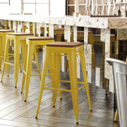Kai Commercial Grade 30" High Backless Yellow Metal Indoor-Outdoor Barstool with Teak Poly Resin Wood Seat