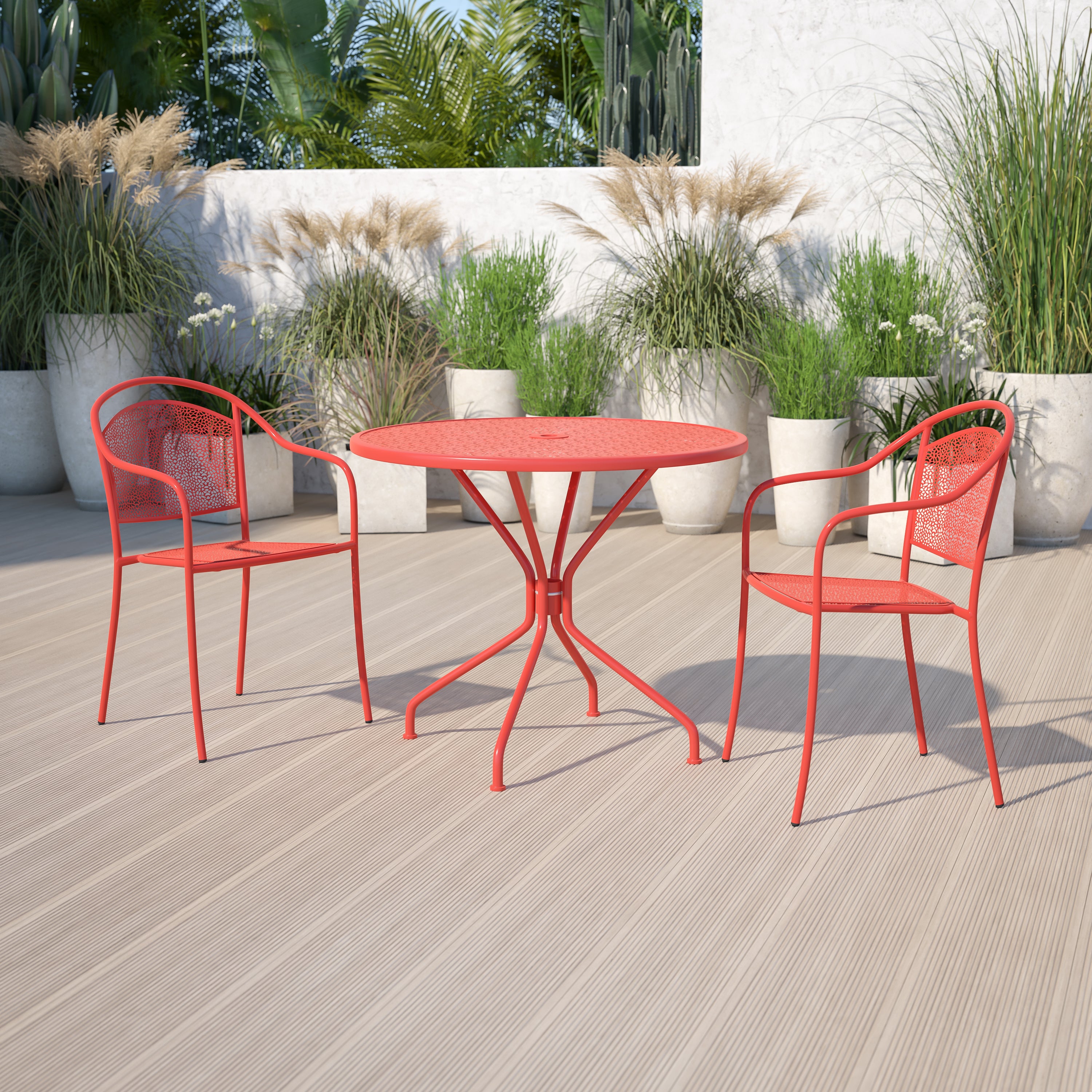Oia Commercial Grade 35.25" Round Coral Indoor-Outdoor Steel Patio Table with Umbrella Hole