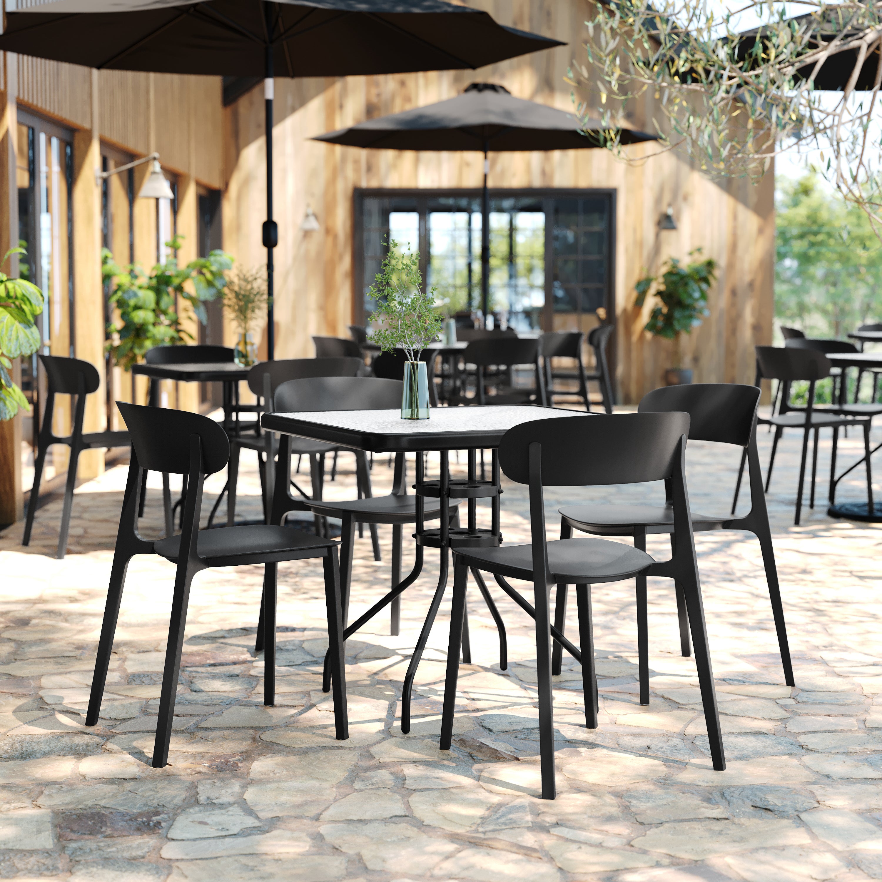 Dover Indoor-Outdoor Stacking Patio Chair with Curved Backrest, Commercial All-Weather Resin Chair in Black