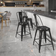 Carly Commercial Grade 24" High Distressed Black Metal Indoor-Outdoor Counter Height Stool with Back