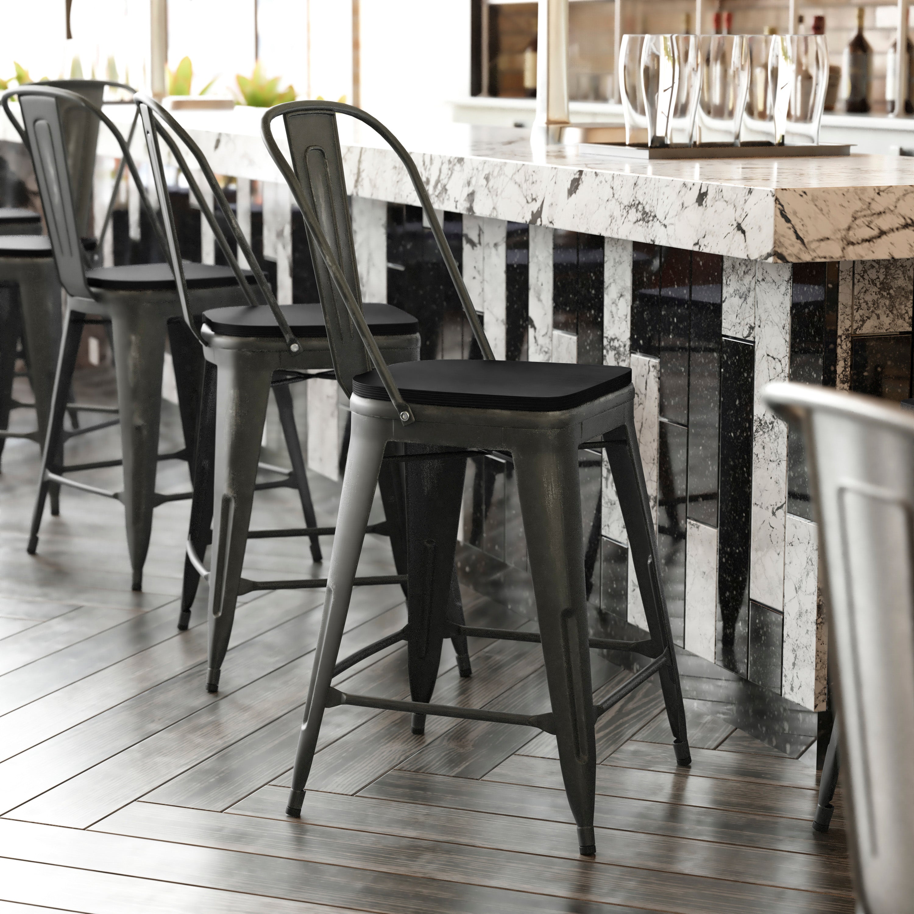Carly Commercial Grade 24" High Black Metal Indoor-Outdoor Counter Height Stool with Back with Black Poly Resin Wood Seat