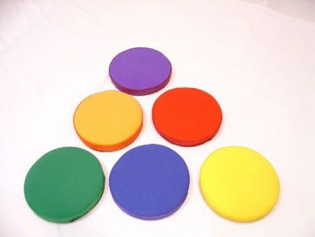 Trumpet Step
Nylon covered foam padding in 6 different colors.  One of the step inserted
with sound device.  13" Dia. x 2" TH.