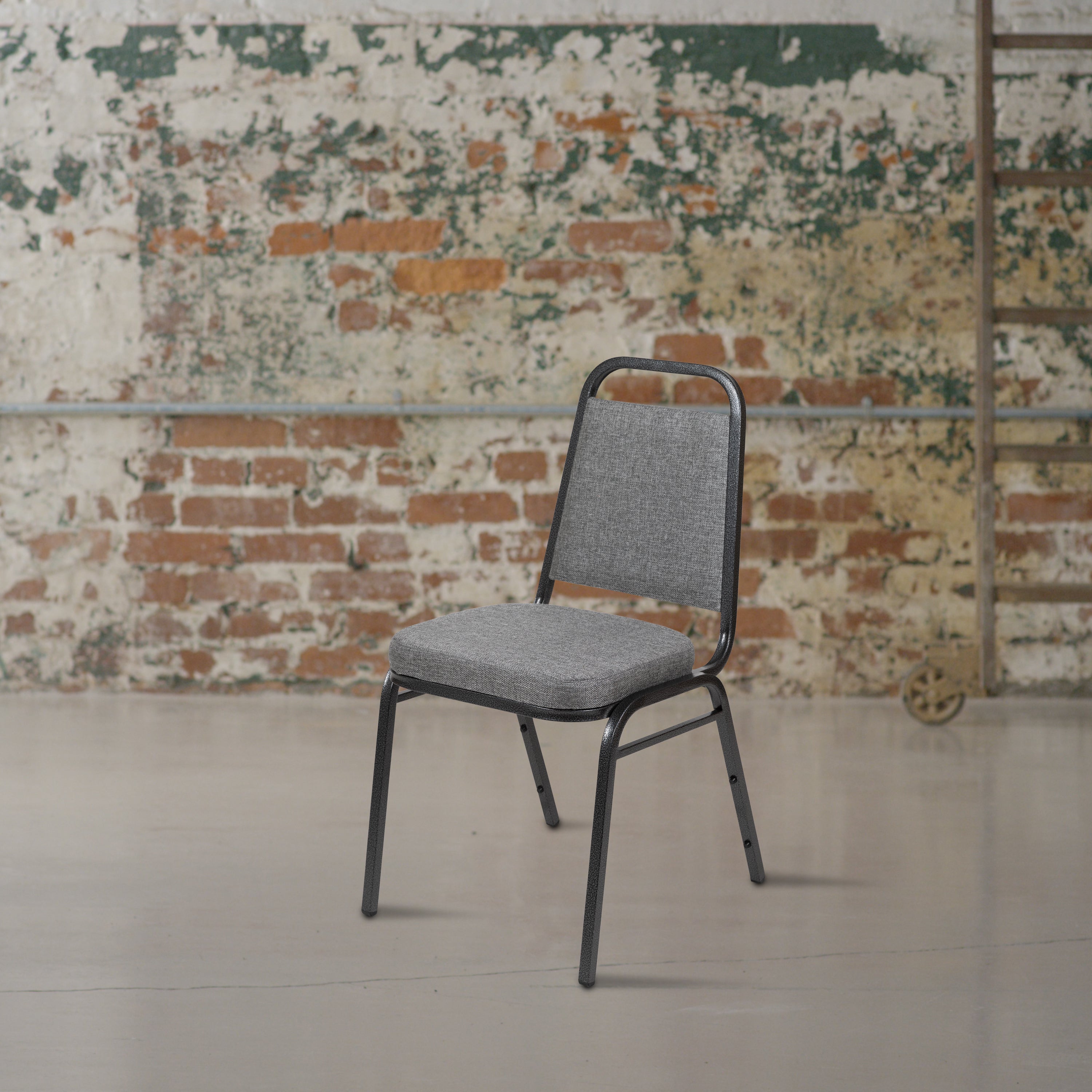 HERCULES Series Trapezoidal Back Stacking Banquet Chair with 2.5" Thick Seat in Gray Fabric - Silver Vein Frame