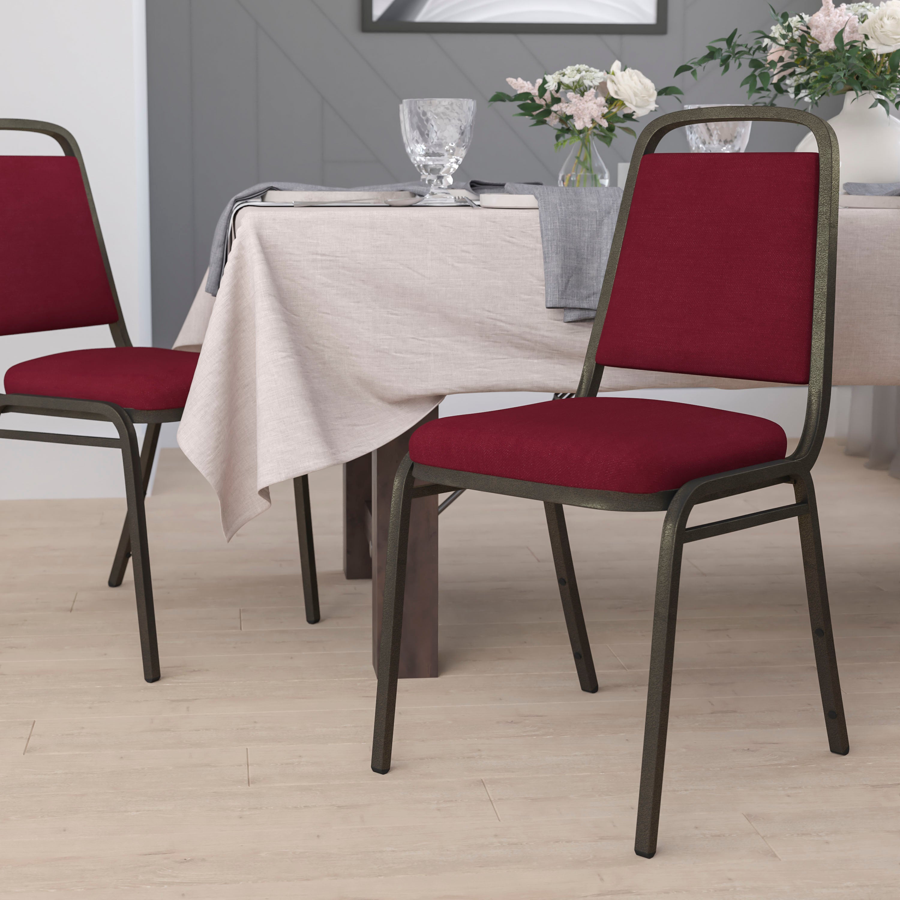 HERCULES Series Trapezoidal Back Stacking Banquet Chair in Burgundy Fabric - Gold Vein Frame