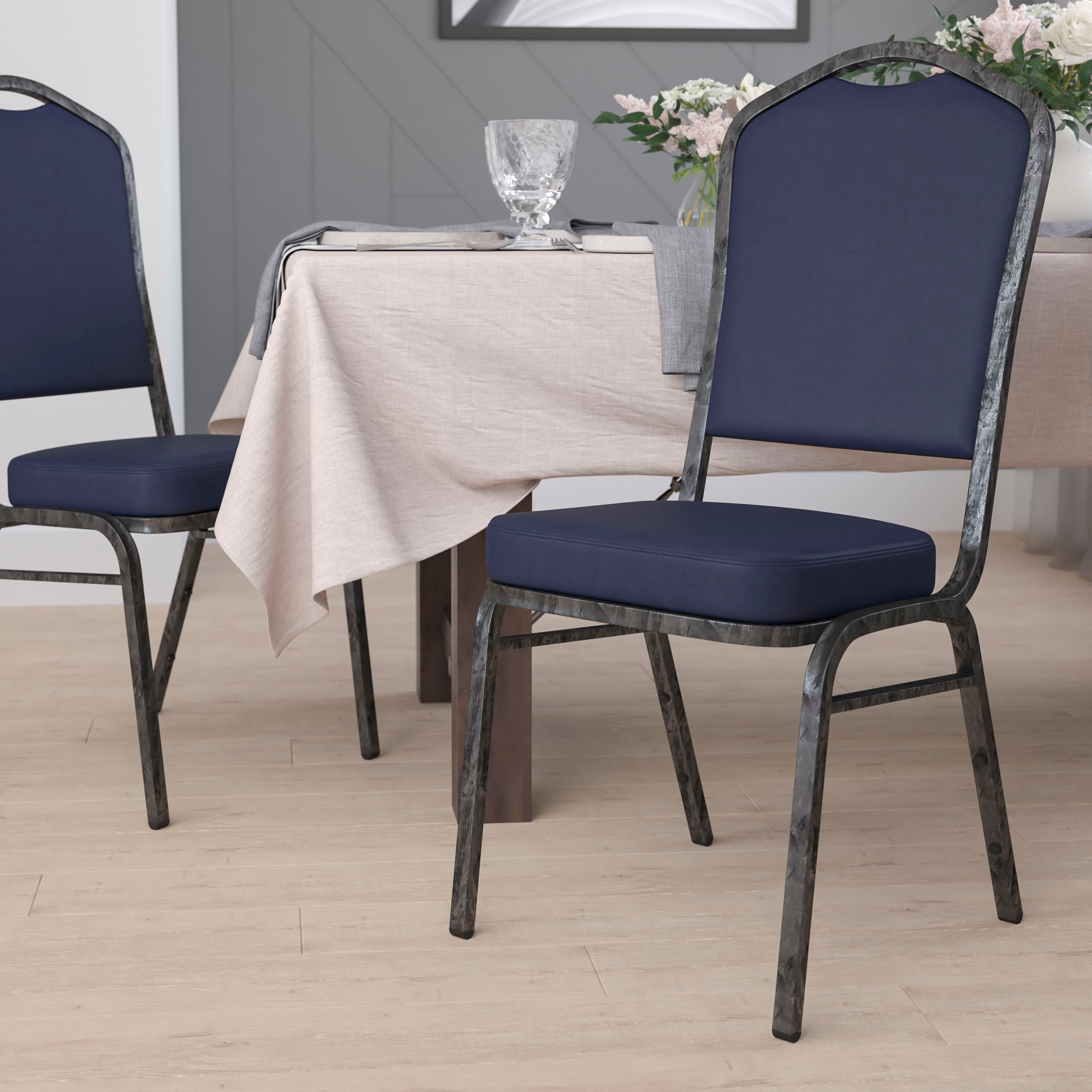 HERCULES Series Crown Back Stacking Banquet Chair in Navy Vinyl - Silver Vein Frame