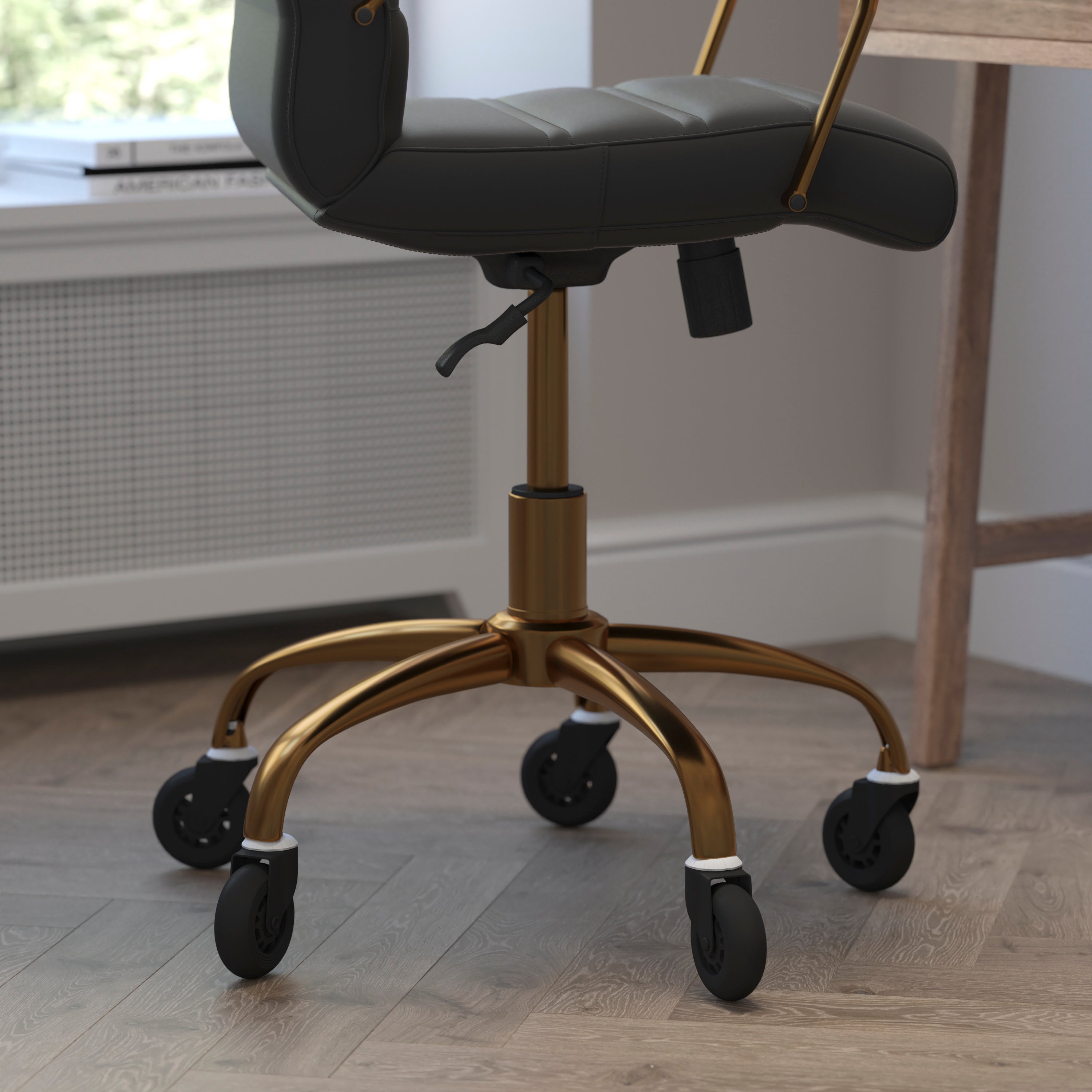 Camilia Mid-Back Black LeatherSoft Executive Swivel Office Chair with Gold Frame, Arms, and Transparent Roller Wheels