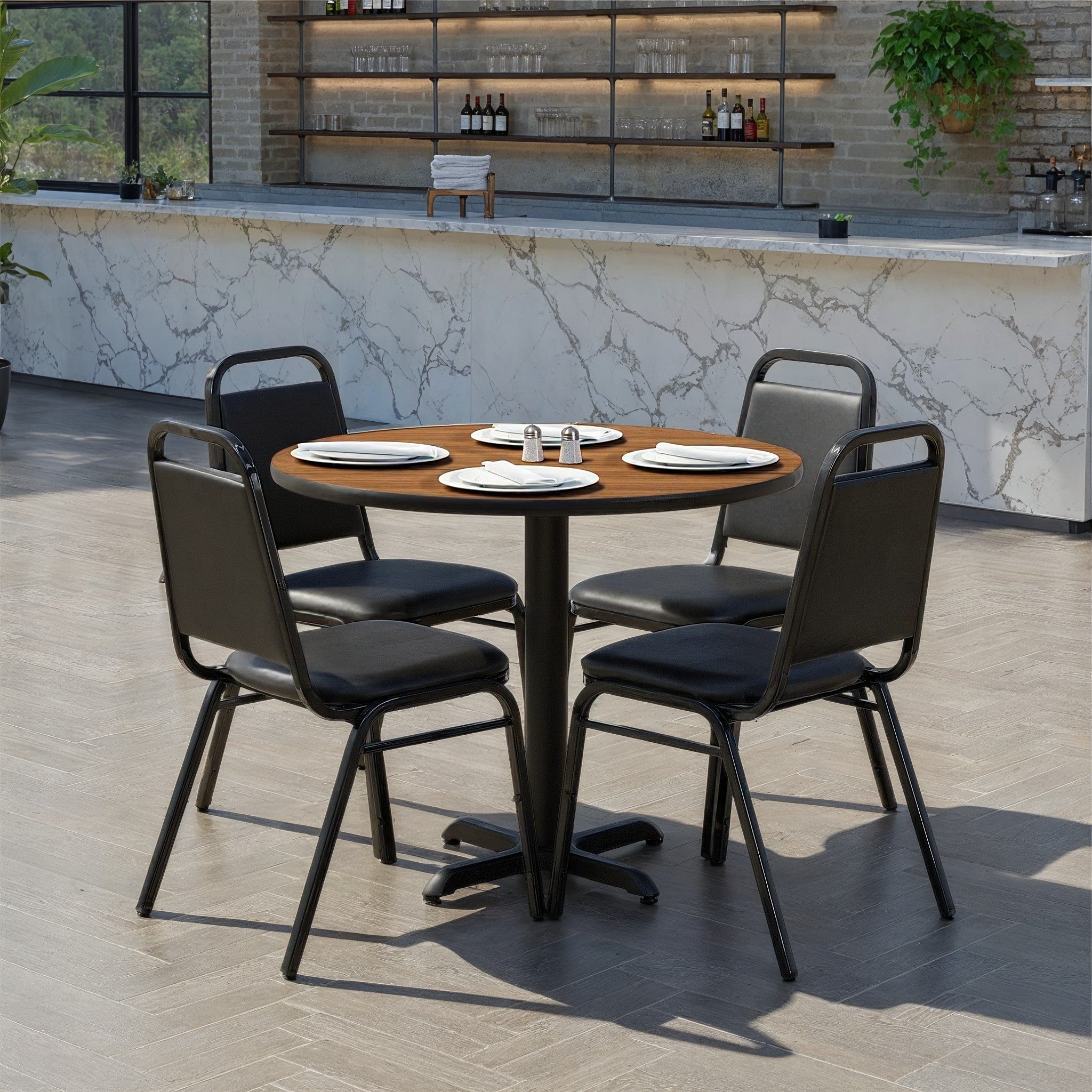 Carlton 36'' Round Walnut Laminate Table Set with X-Base and 4 Black Trapezoidal Back Banquet Chairs