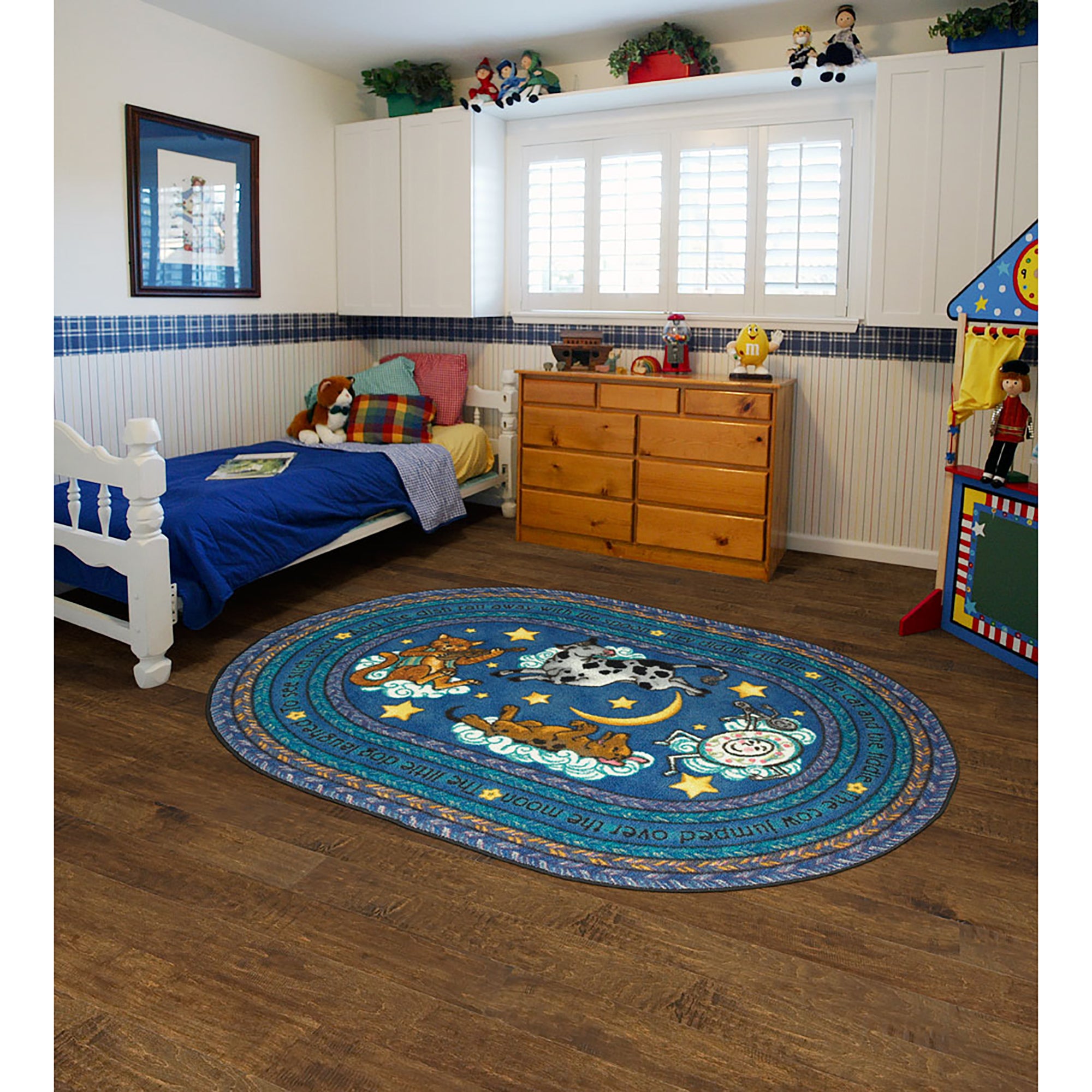 Hey Diddle Diddle 5'4" x 7'8" Oval area rug in color Blue