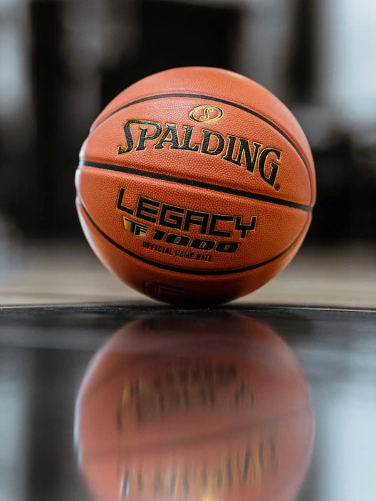 Spalding TF-1000 Legacy Indoor Game Basketball, Orange, Intermediate Size 6, 28.5 inches