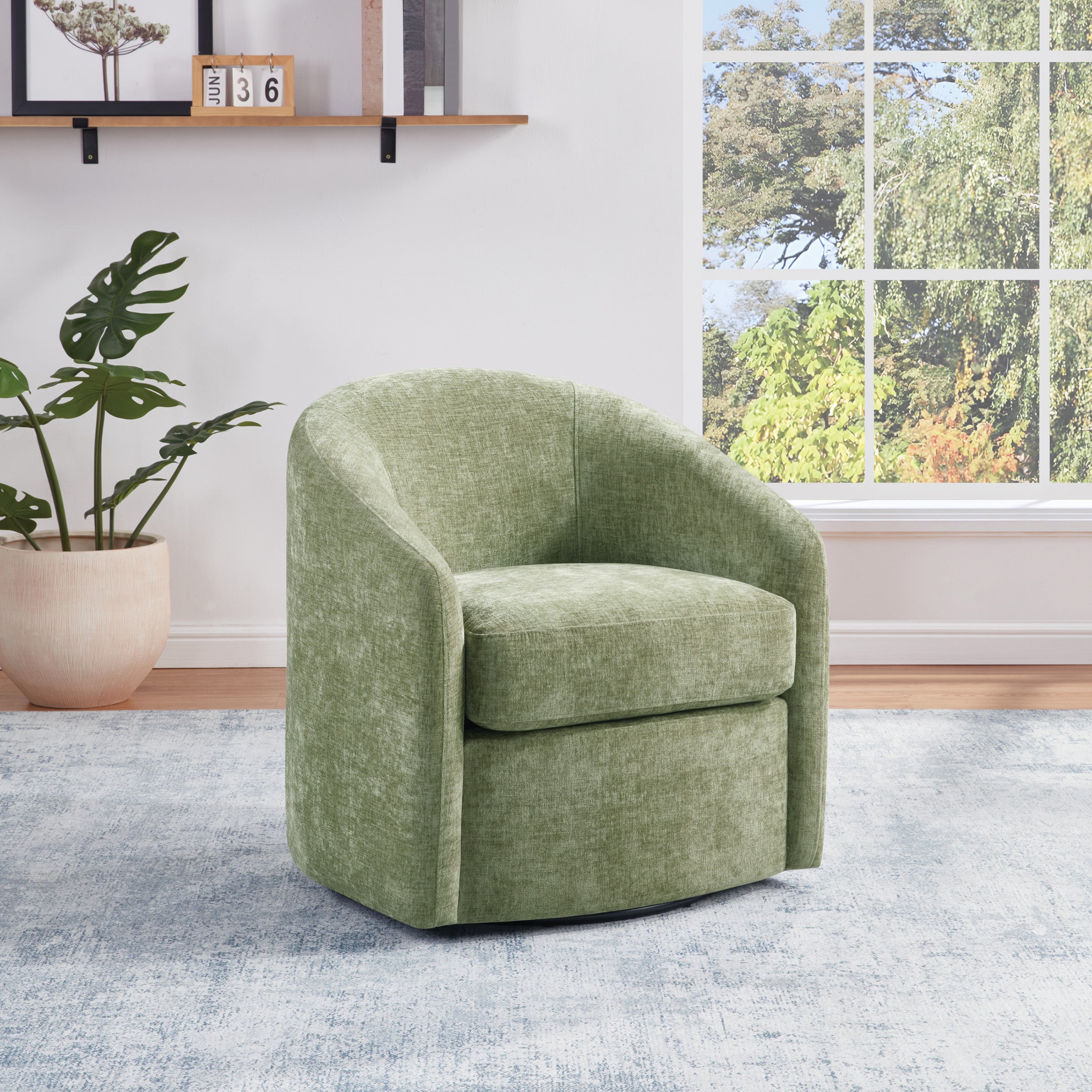 Bella Swivel Chair in Leaf Fabric