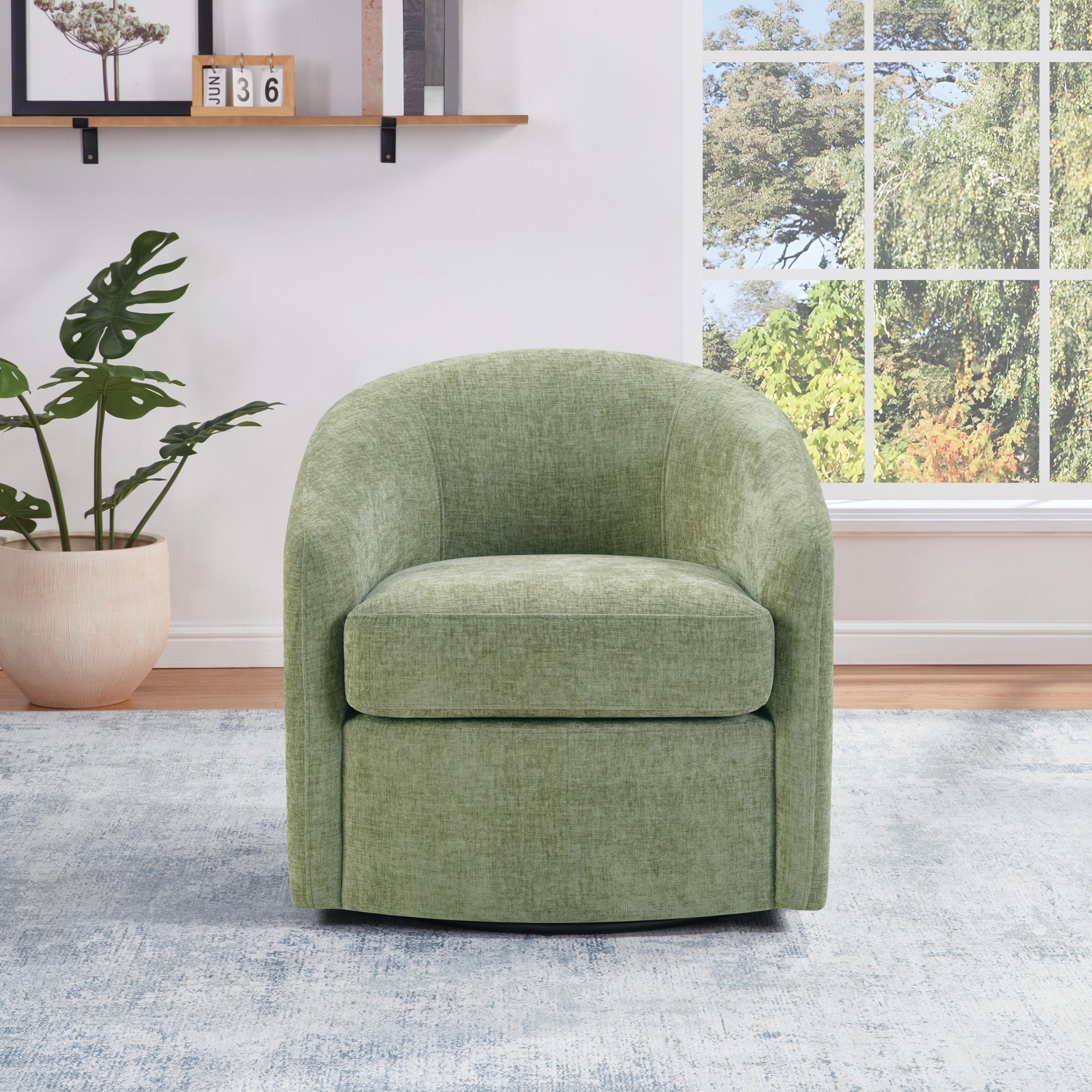 Bella Swivel Chair in Leaf Fabric