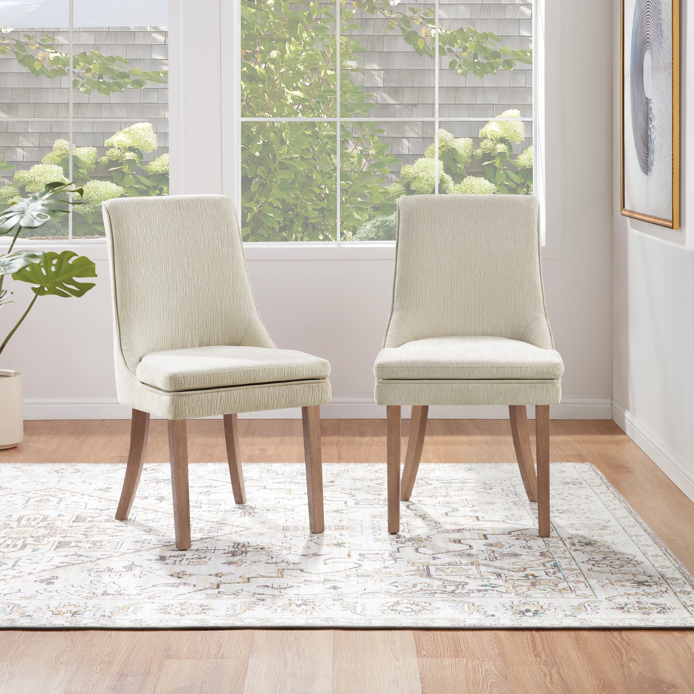 Genna Dining Chair in Cream Fabric with Oak Finished legs.