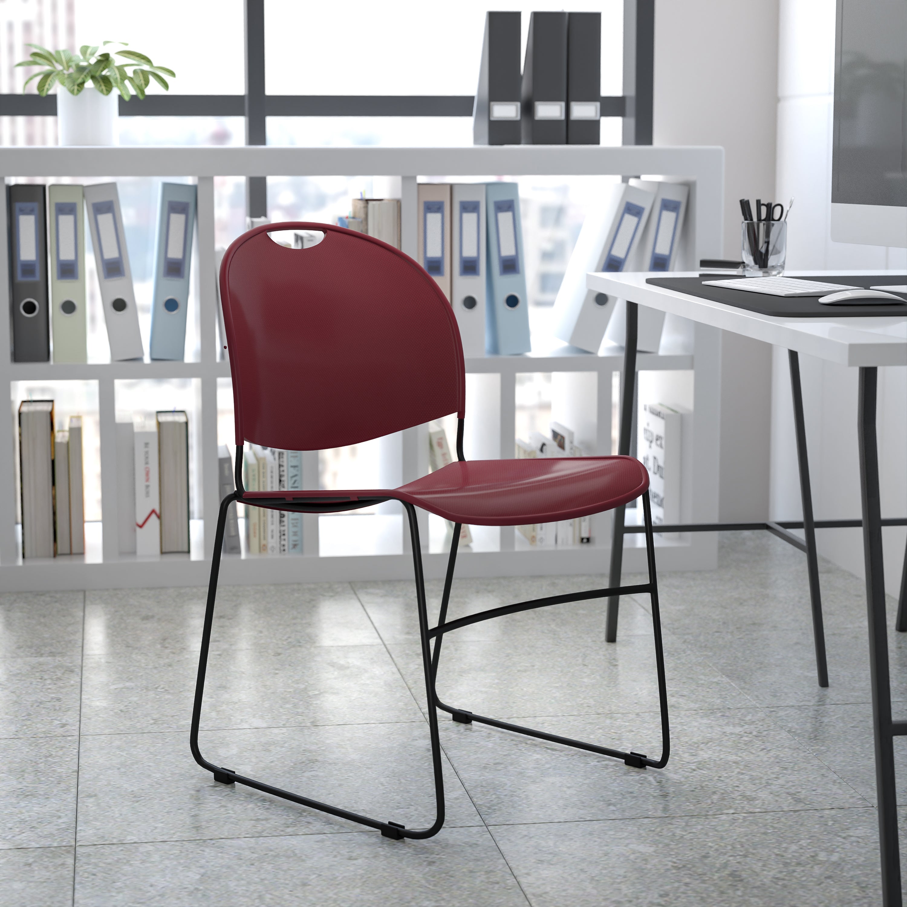 HERCULES Series 880 lb. Capacity Burgundy Ultra-Compact Stack Chair with Black Powder Coated Frame