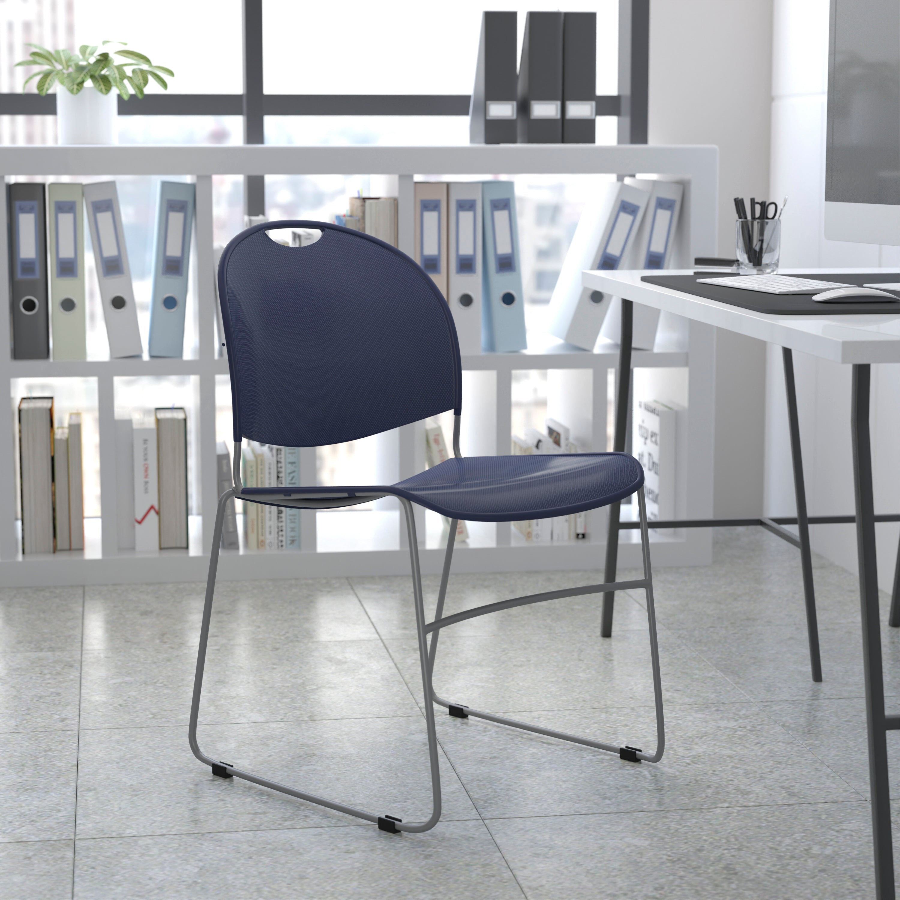 HERCULES Series 880 lb. Capacity Navy Ultra-Compact Stack Chair with Silver Powder Coated Frame