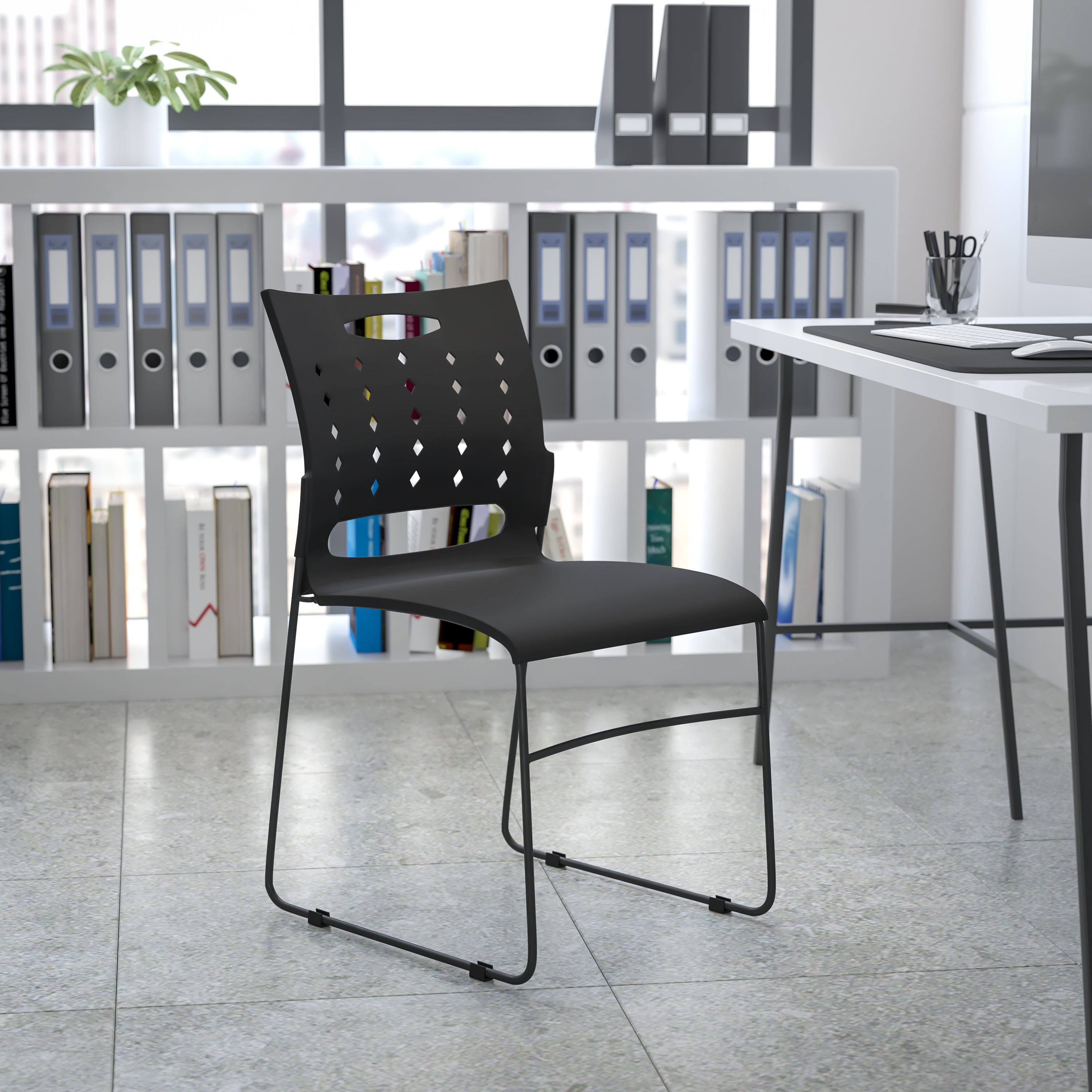 HERCULES Series 881 lb. Capacity Black Sled Base Stack Chair with Air-Vent Back