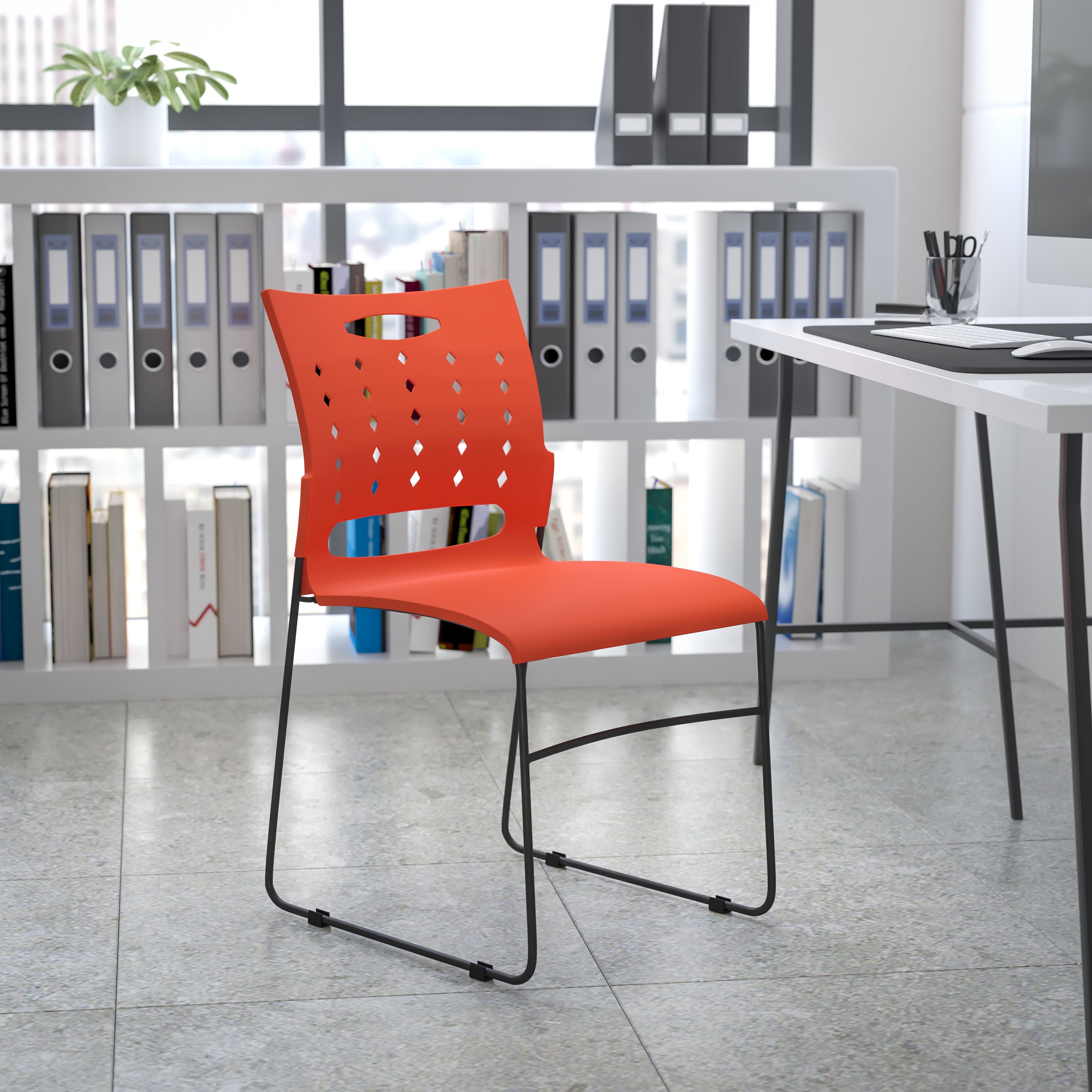 HERCULES Series 881 lb. Capacity Orange Sled Base Stack Chair with Air-Vent Back