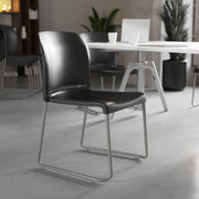 HERCULES Series 880 lb. Capacity Black Full Back Contoured Stack Chair with Gray Powder Coated Sled Base