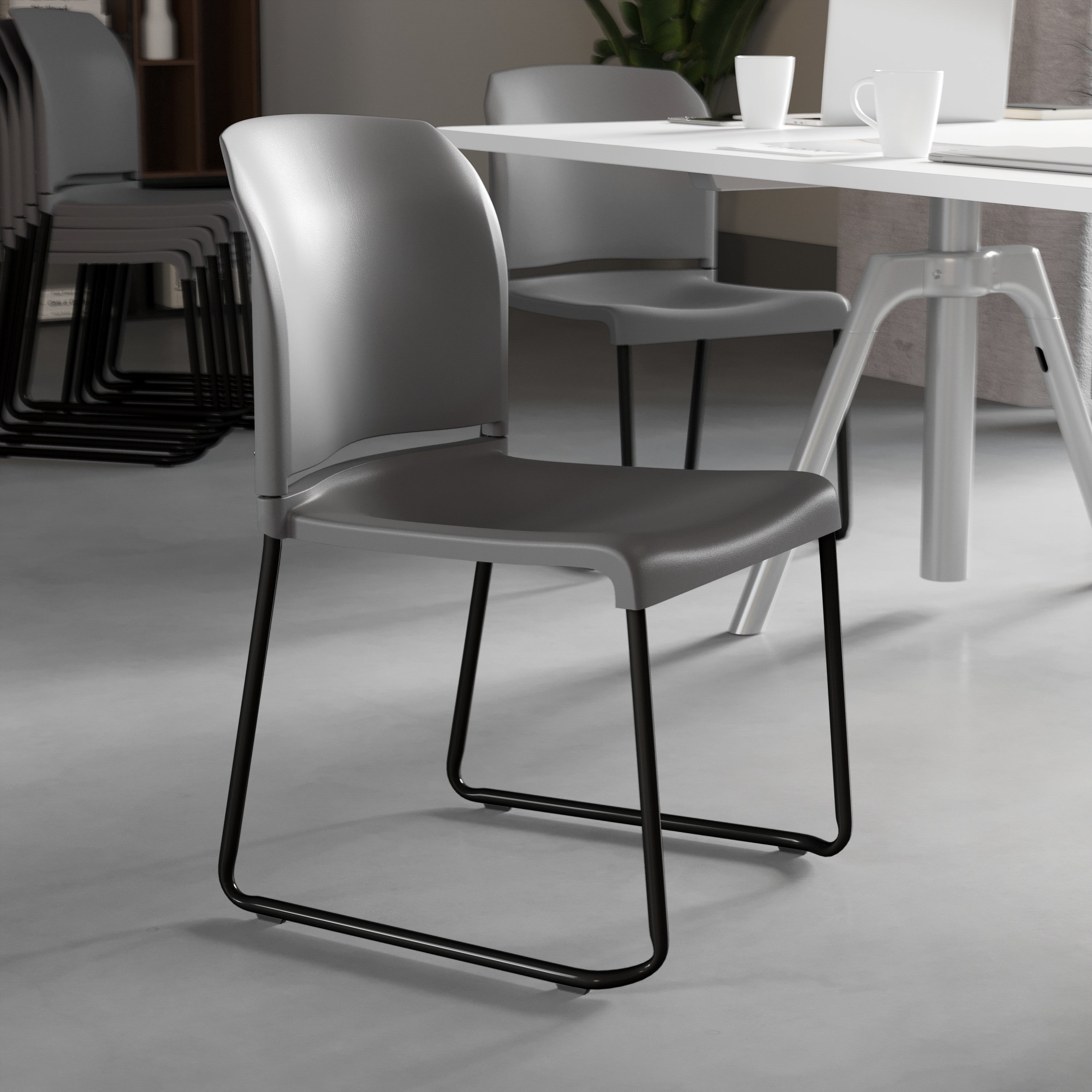 HERCULES Series 880 lb. Capacity Gray Full Back Contoured Stack Chair with Black Powder Coated Sled Base