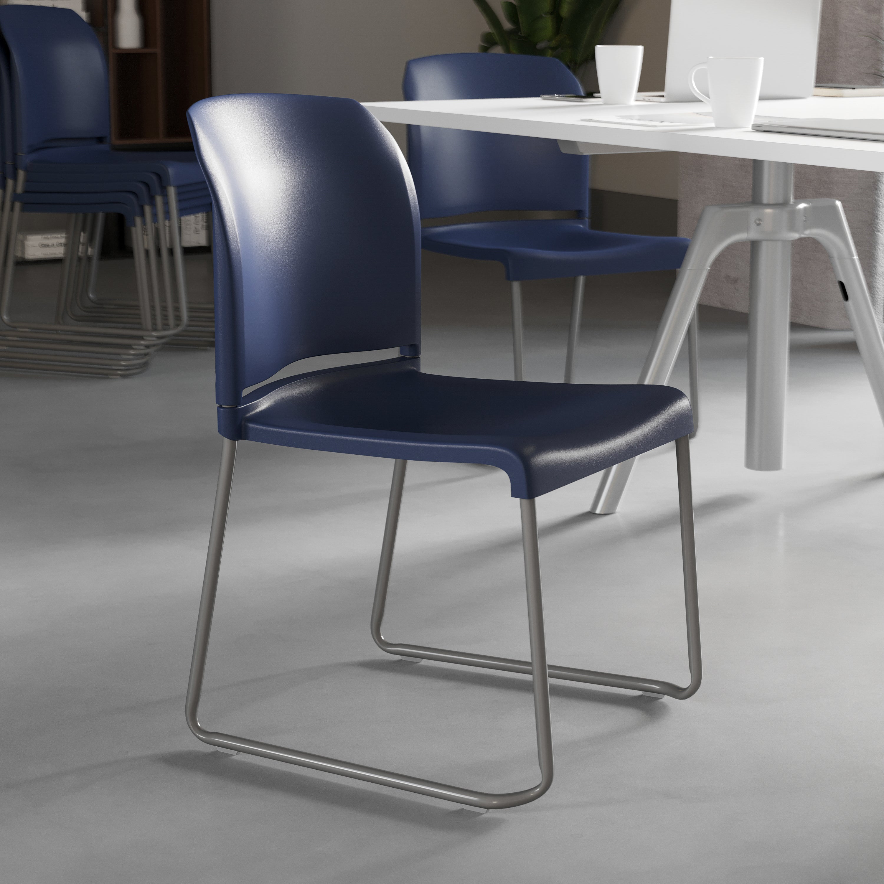 HERCULES Series 880 lb. Capacity Navy Full Back Contoured Stack Chair with Gray Powder Coated Sled Base