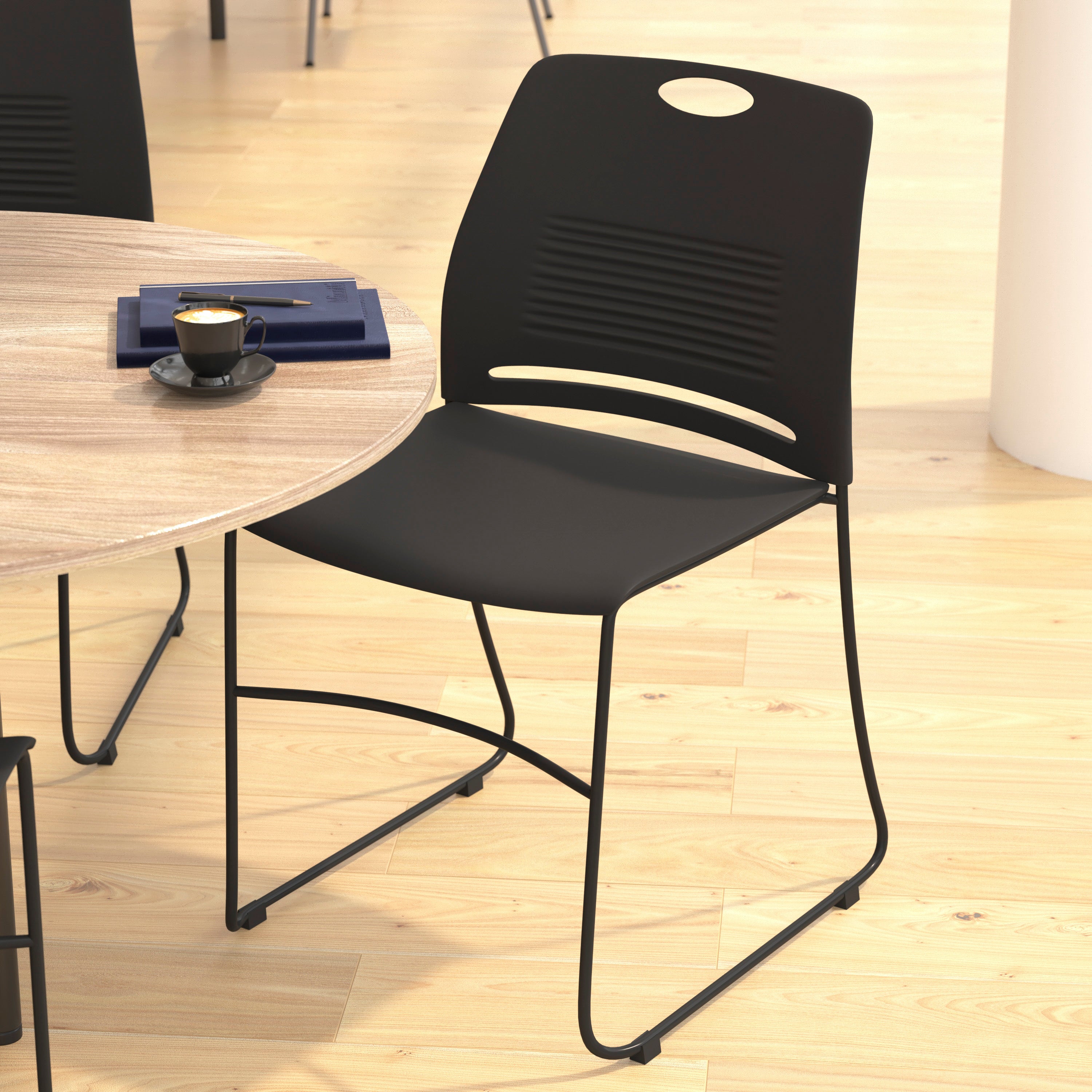 HERCULES Series Commercial Grade 660 lb. Capacity Black Plastic Stack Chair with Black Powder Coated Sled Base Frame and Integrated Carrying Handle