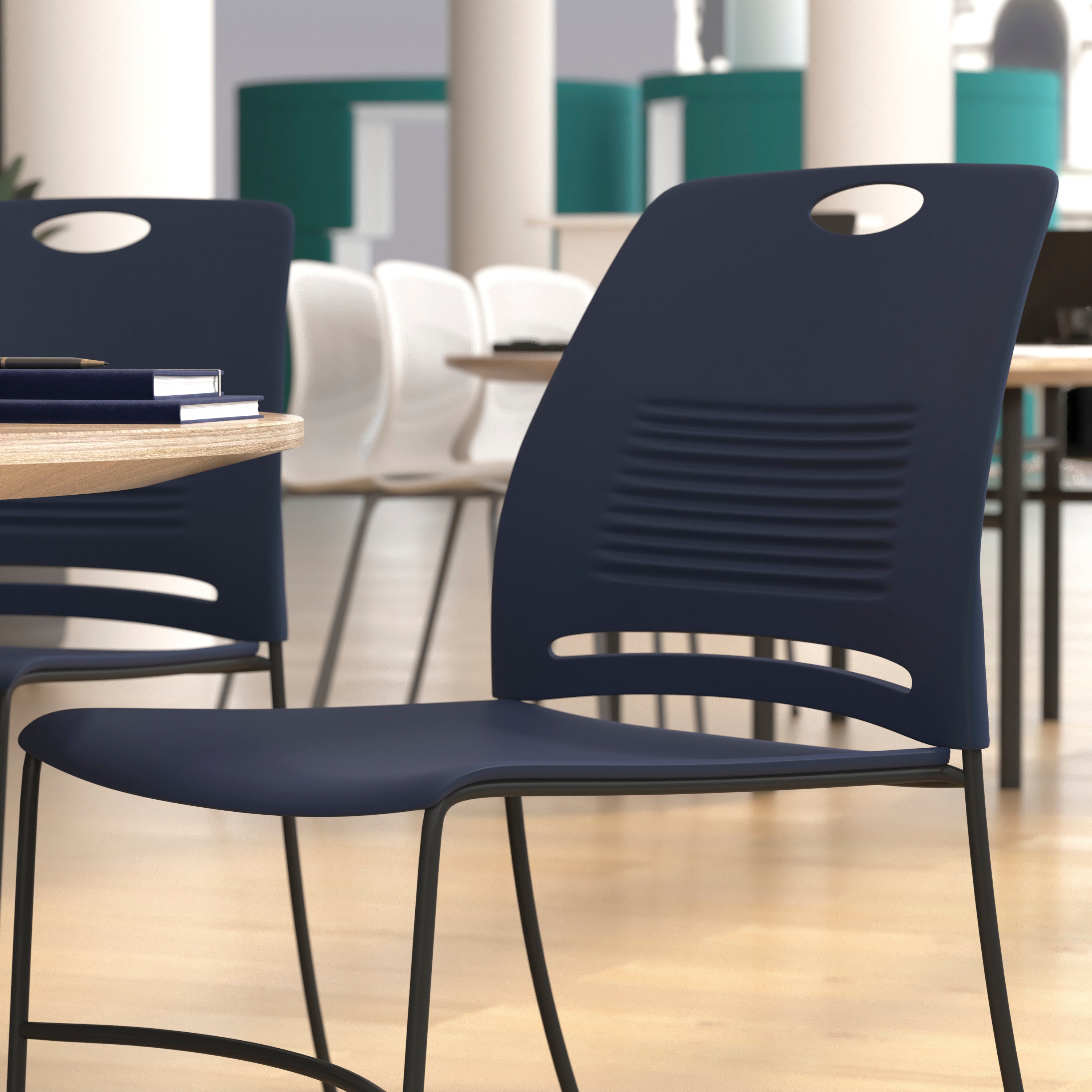 HERCULES Series Commercial Grade 660 lb. Capacity Navy Plastic Stack Chair with Black Powder Coated Sled Base Frame and Integrated Carrying Handle