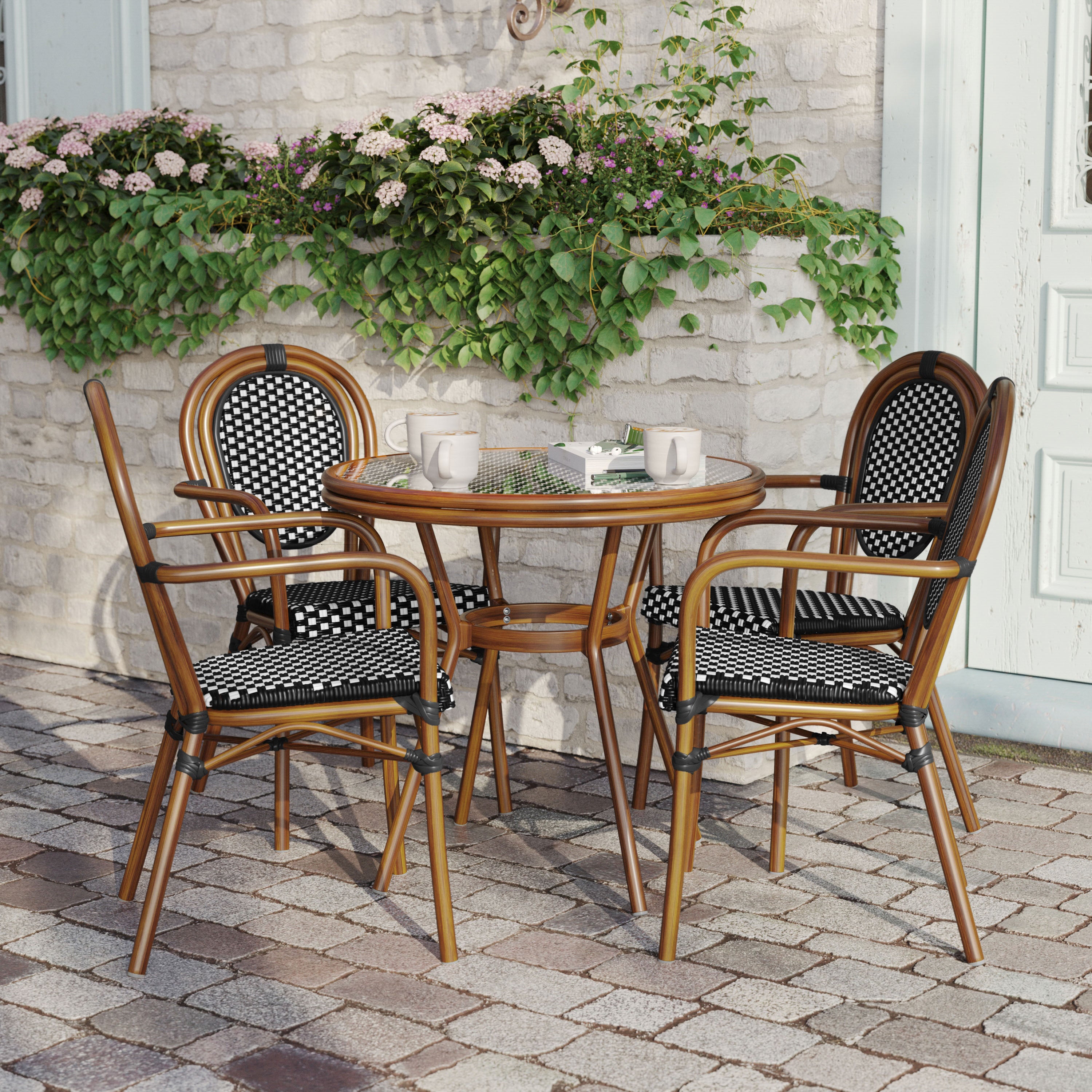 Lourdes Indoor/Outdoor Commercial Bistro 31.5" Table, Black and White PE Rattan, Glass Top with 4 Stack Chairs