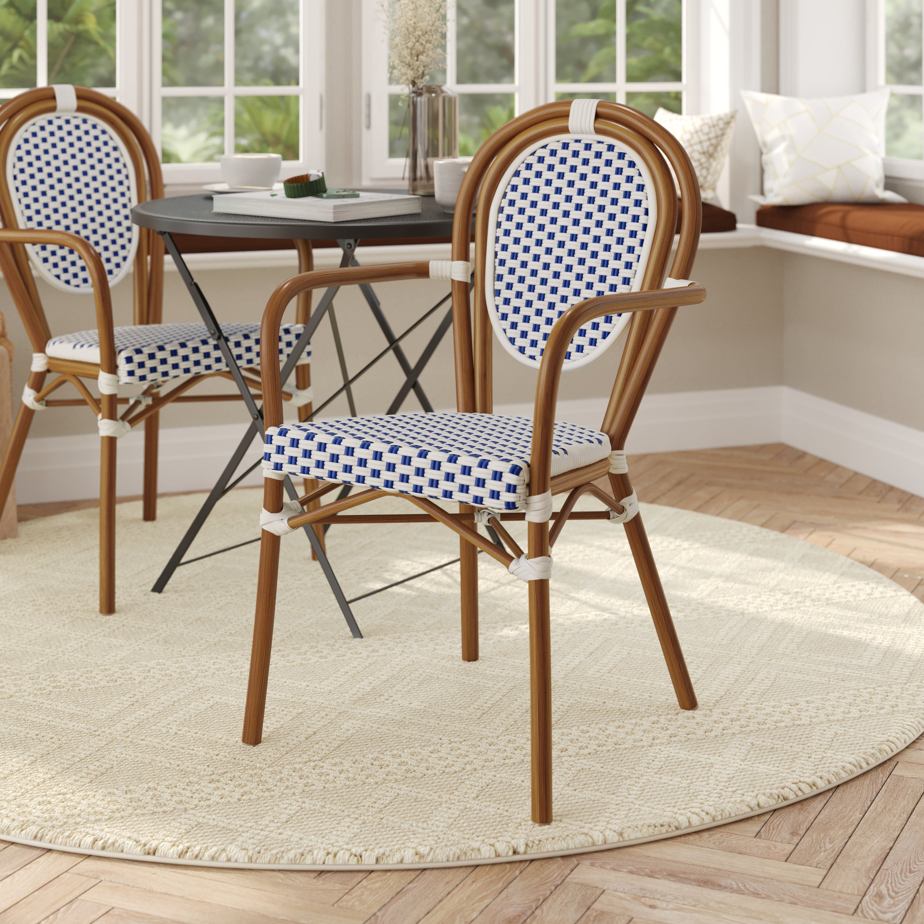 Lourdes Indoor/Outdoor Commercial Thonet Bistro Stacking Chair with Arms, White and Navy PE Rattan and Bamboo Print Aluminum Frame in Natural