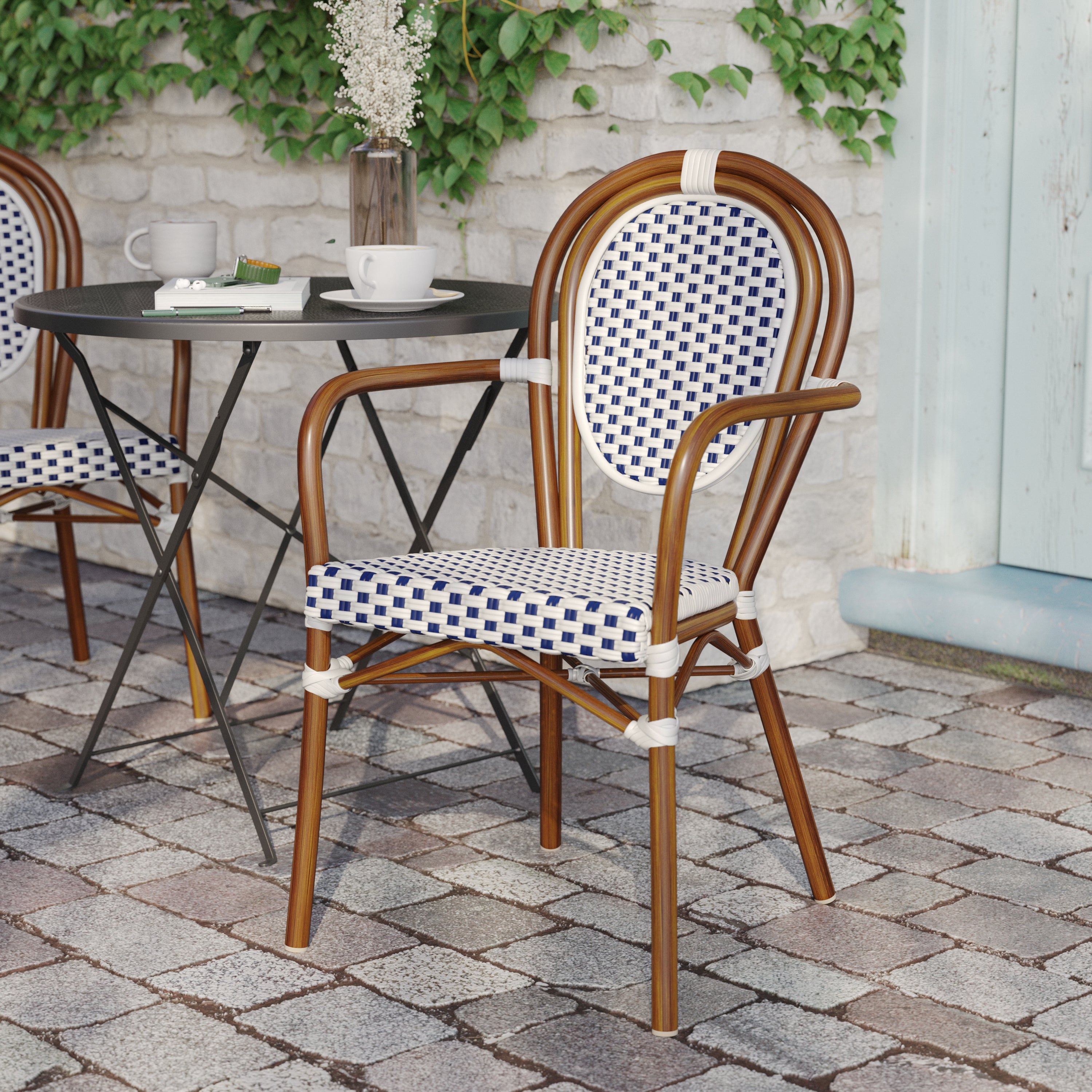 Lourdes Indoor/Outdoor Commercial Thonet Bistro Stacking Chair with Arms, White and Navy PE Rattan and Bamboo Print Aluminum Frame in Natural