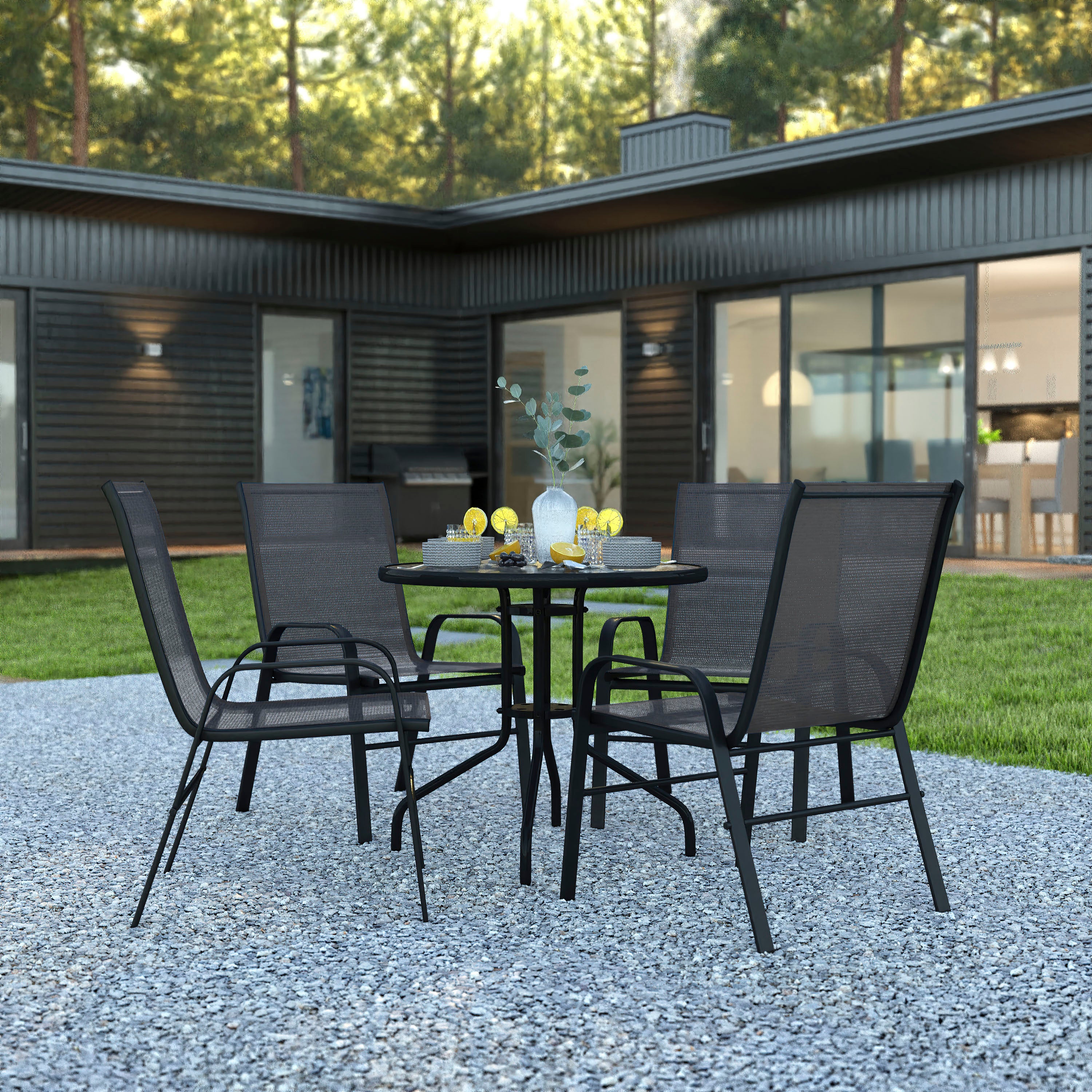 Brazos 5 Piece Outdoor Patio Dining Set - 31.5" Round Tempered Glass Patio Table, 4 Black Flex Comfort Stack Chairs