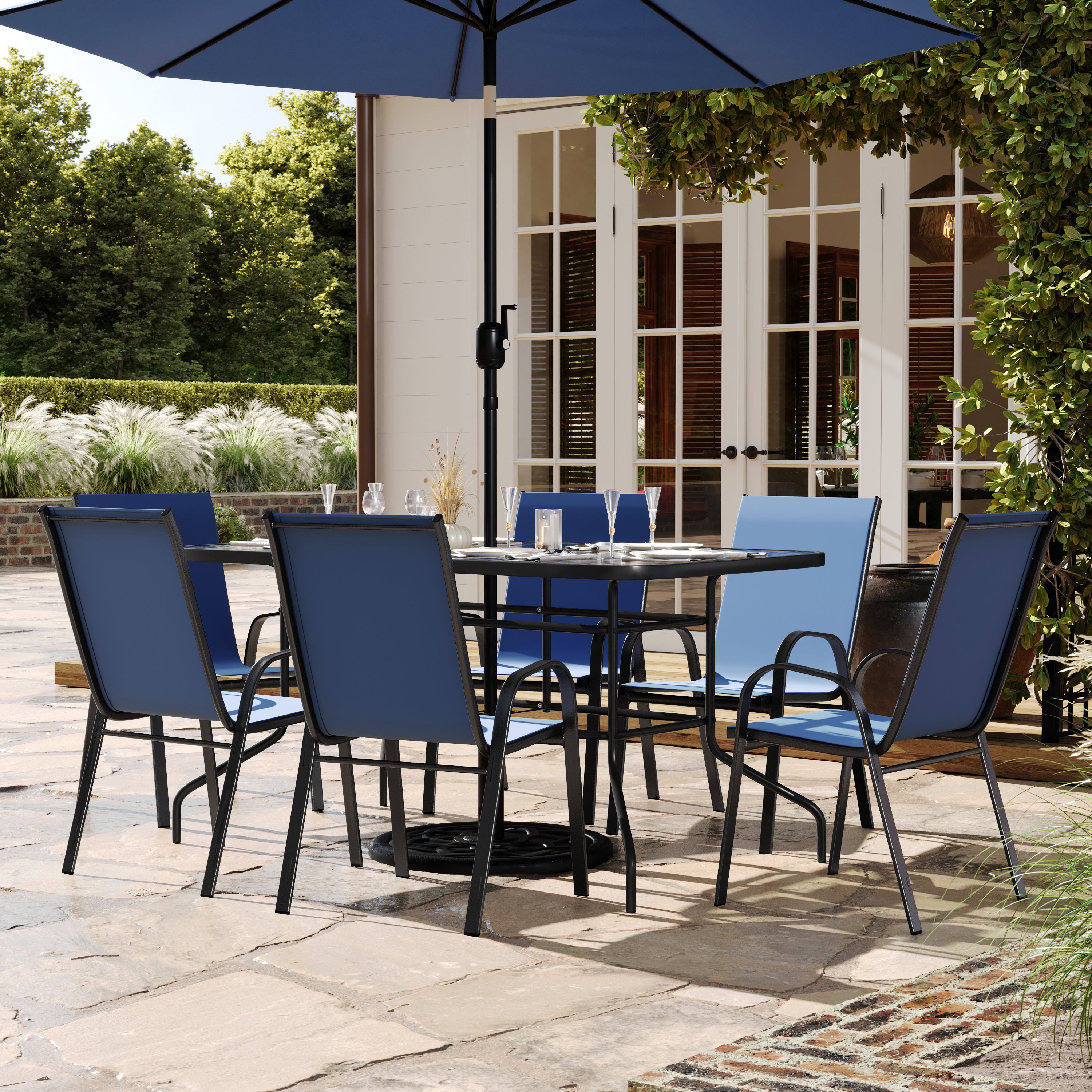 Brazos 7 Piece Outdoor Patio Dining Set - 55" Tempered Glass Patio Table with Umbrella Hole, 6 Navy Flex Comfort Stack Chairs