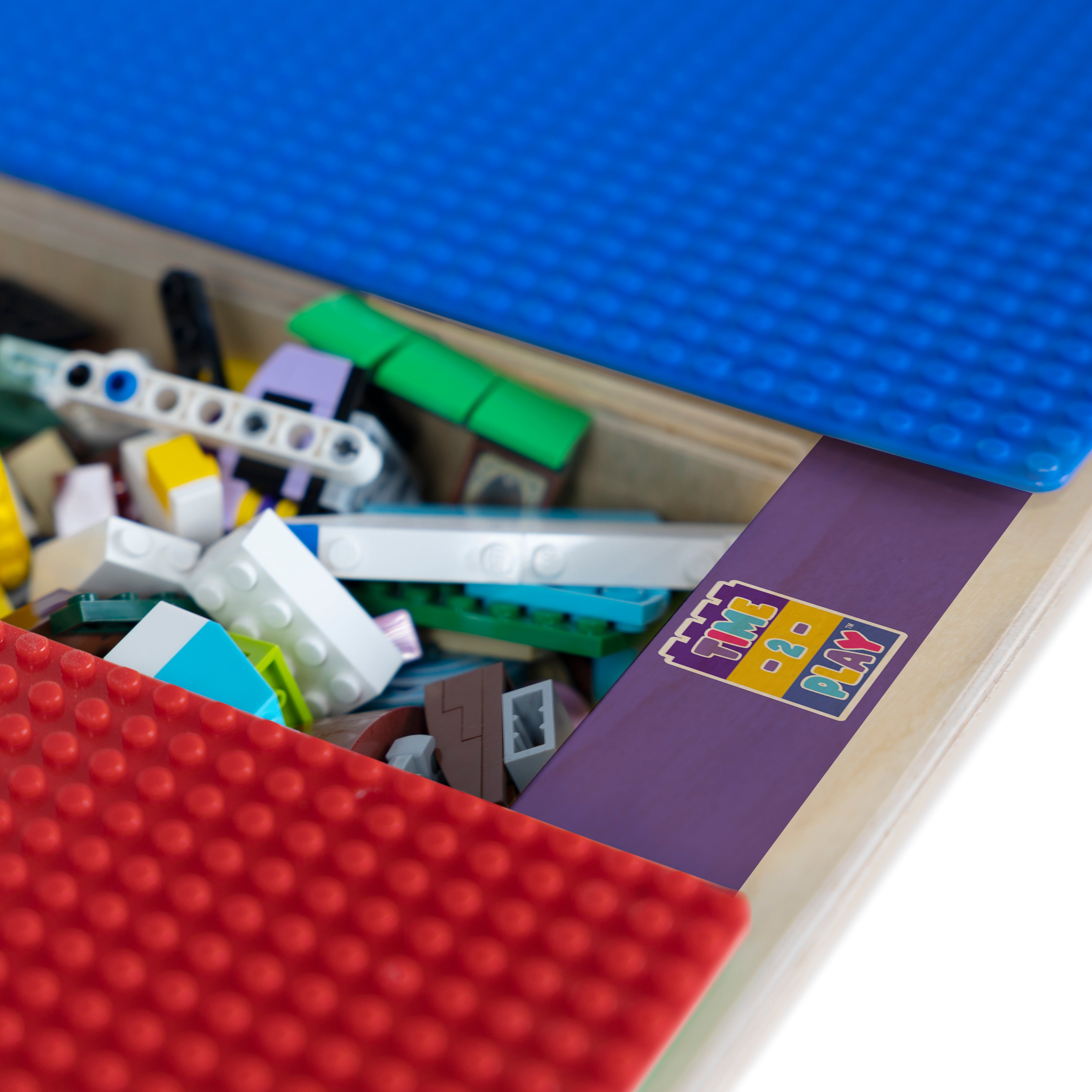 Square Time-2-Play Table with a trough, along with 20" legs and a LEGO® Compatible Grid of RED/BLUE Color