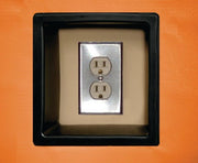 Duplex Outlet Cutout With Molded Black Trim Insert