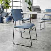 HERCULES 500 lb. Capacity High Density Navy Vinyl Stacking Chair with Sled Base