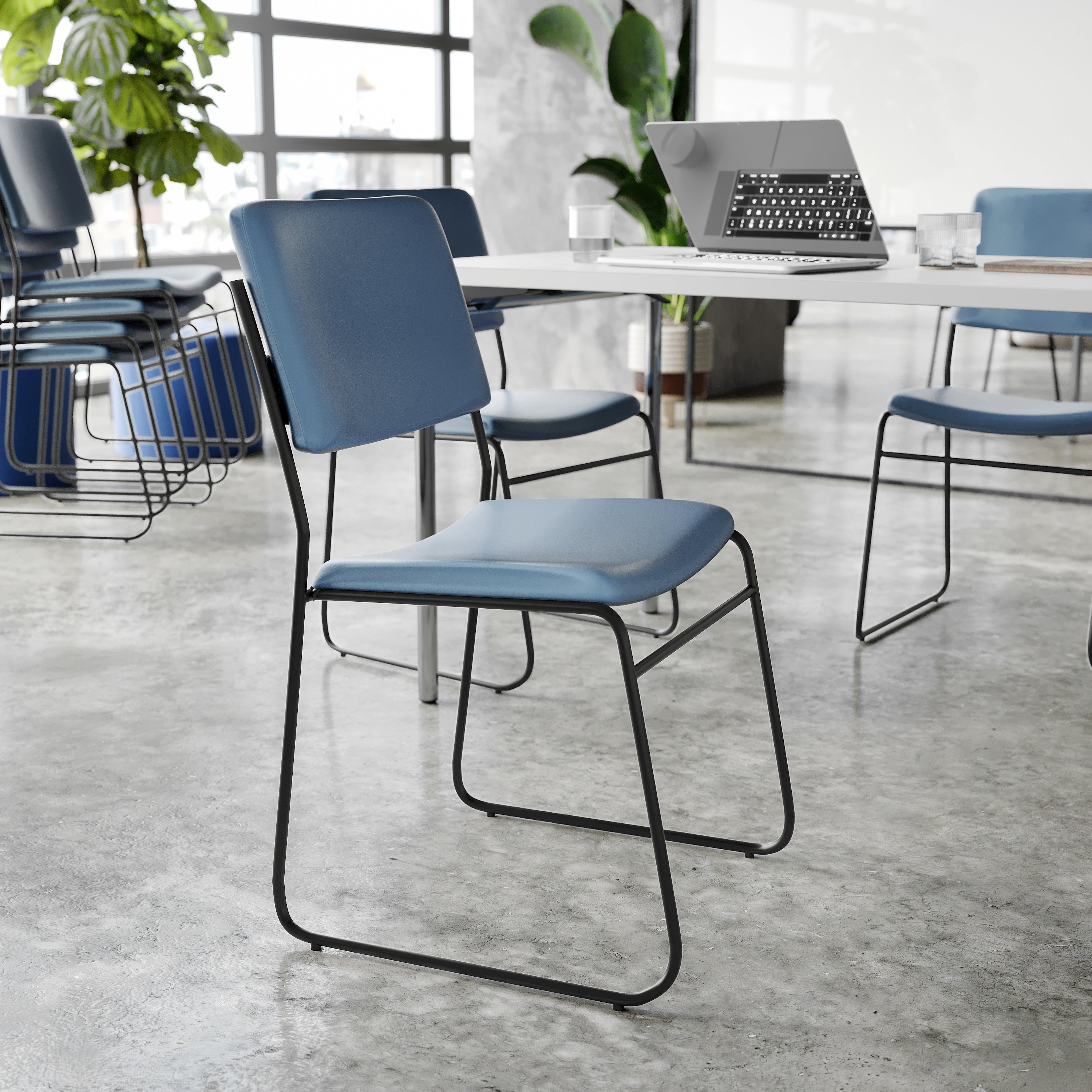 HERCULES 500 lb. Capacity High Density Navy Vinyl Stacking Chair with Sled Base