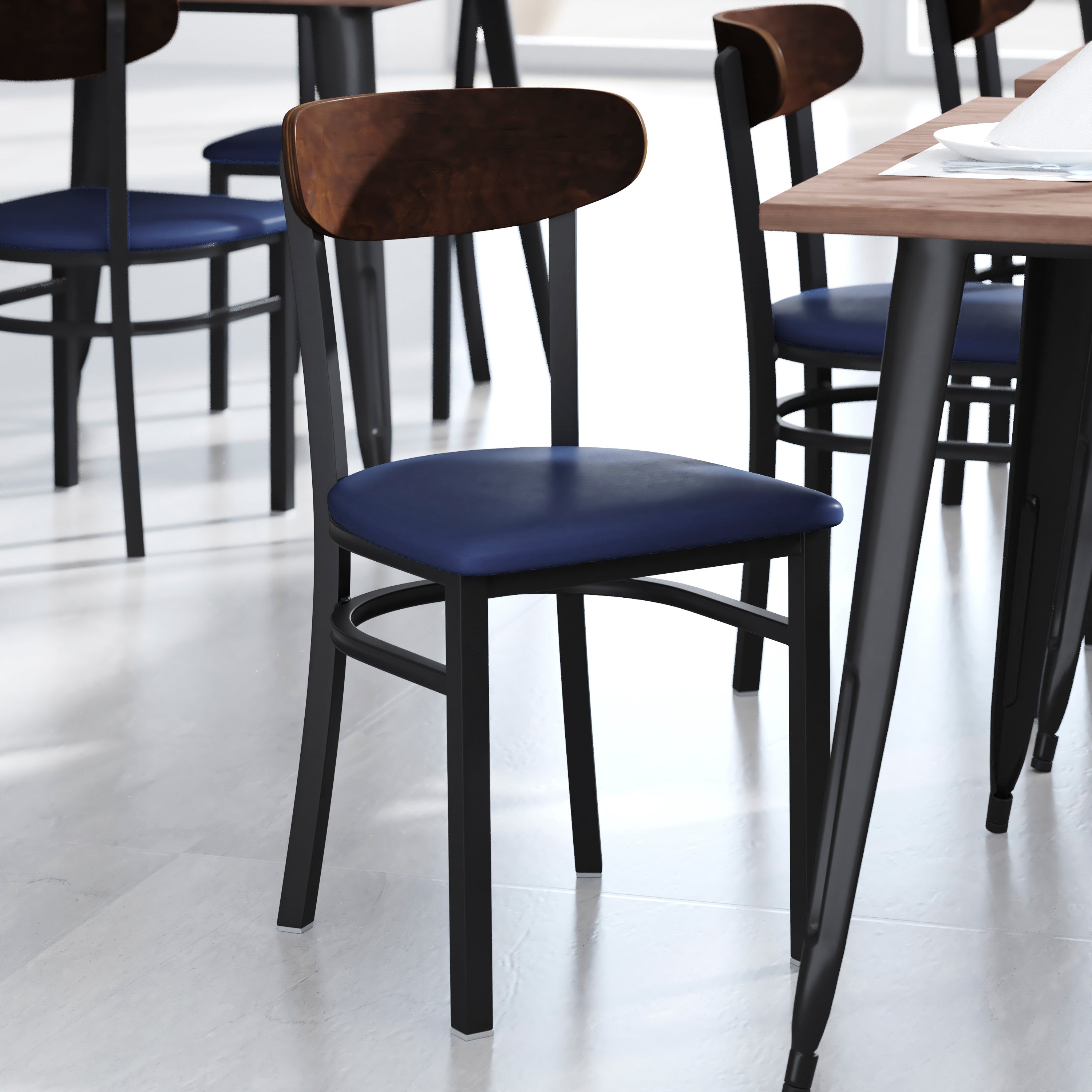 Wright Commercial Dining Chair with 500 LB. Capacity Black Steel Frame, Walnut Finish Wooden Boomerang Back, and Blue Vinyl Seat