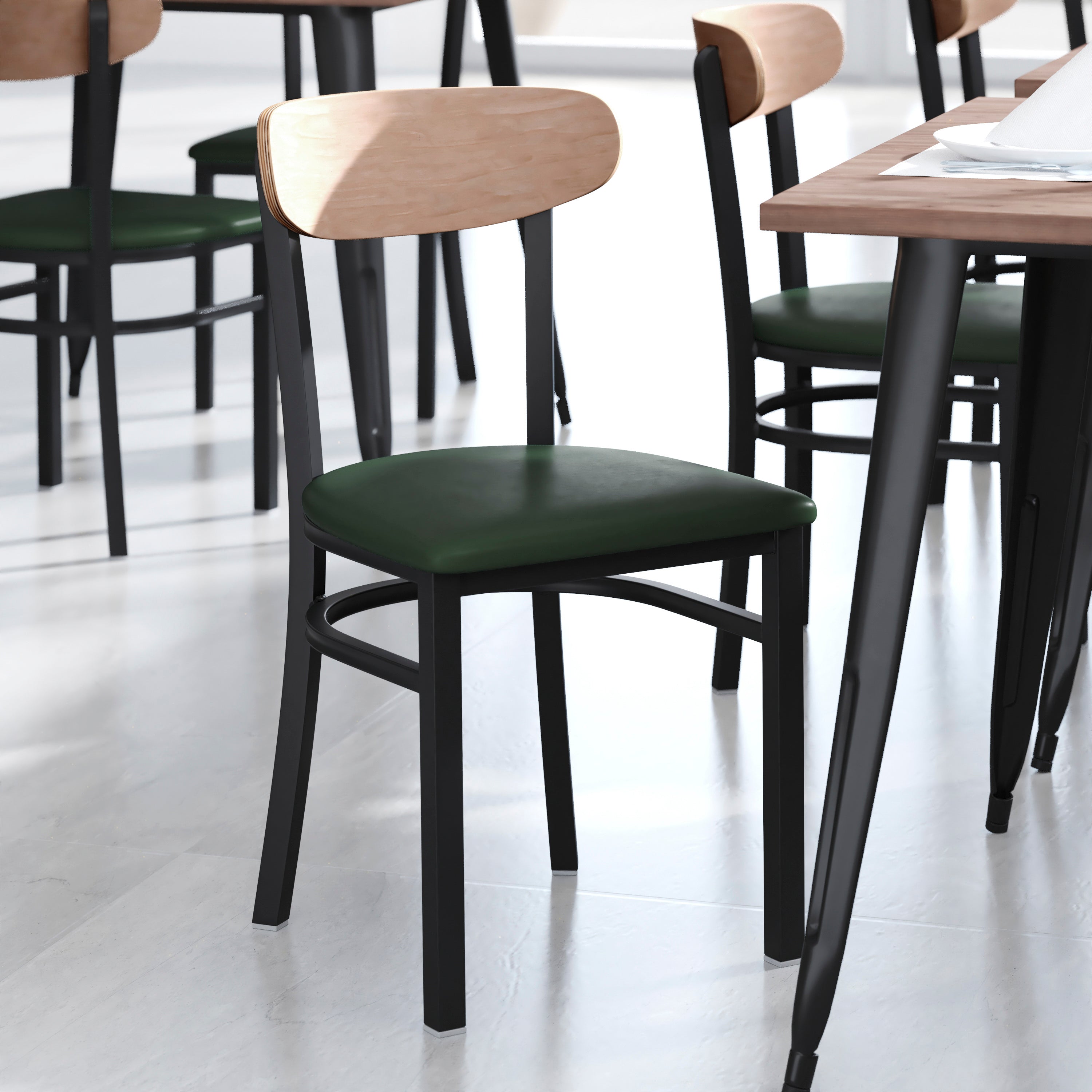 Wright Commercial Dining Chair with 500 LB. Capacity Black Steel Frame, Natural Birch Finish Wooden Boomerang Back, and Green Vinyl Seat