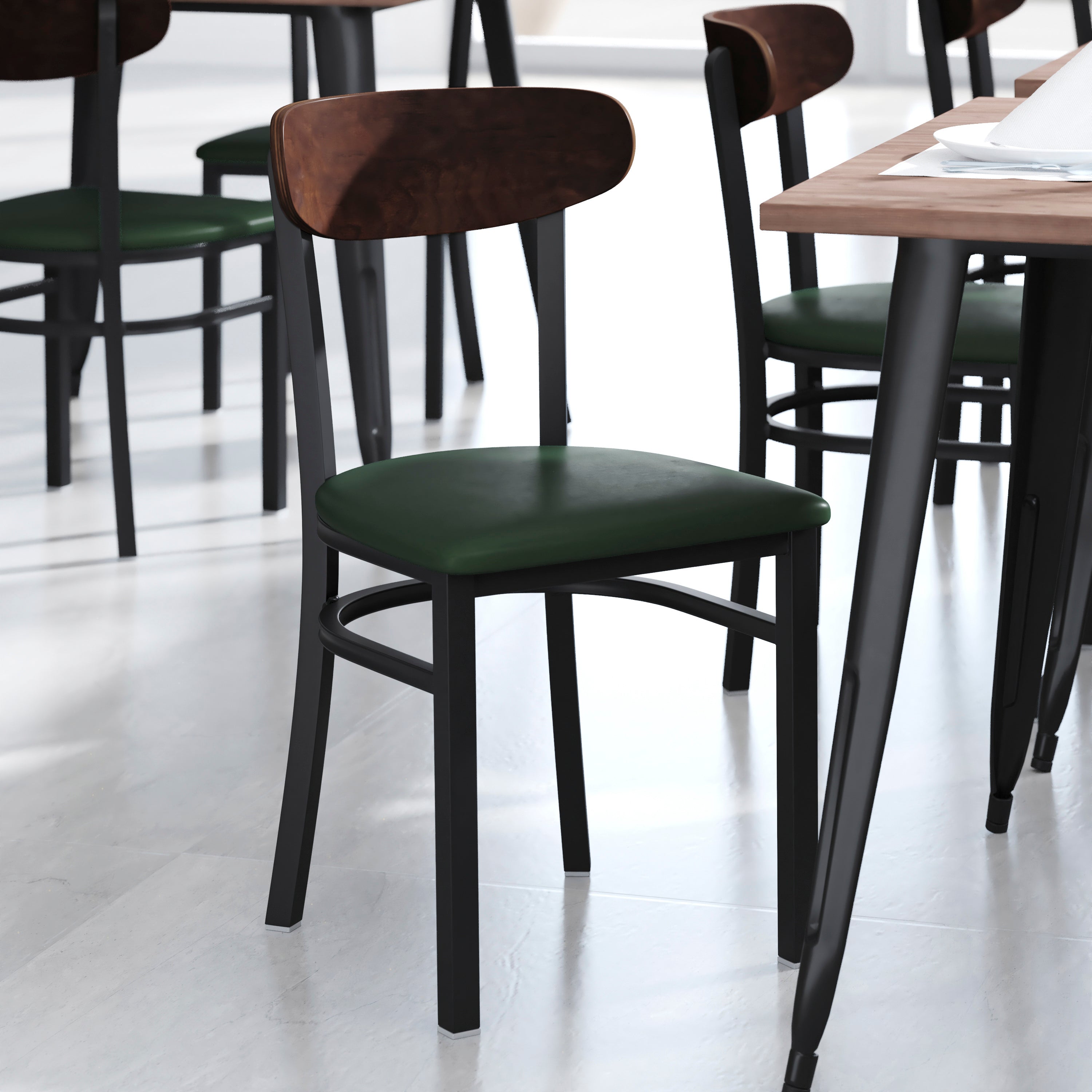 Wright Commercial Dining Chair with 500 LB. Capacity Black Steel Frame, Walnut Finish Wooden Boomerang Back, and Green Vinyl Seat